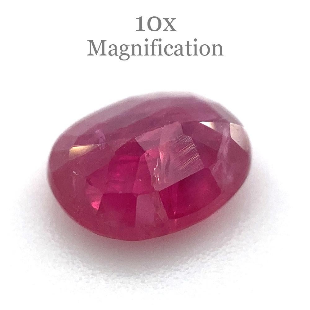 Description:

Gem Type: Ruby 
Number of Stones: 1
Weight: 0.97 cts
Measurements: 6.30x5.30x5.30 mm
Shape: Oval
Cutting Style Crown: Modified Brilliant Cut
Cutting Style Pavilion: Step Cut 
Transparency: Transparent
Clarity: Heavily Included: