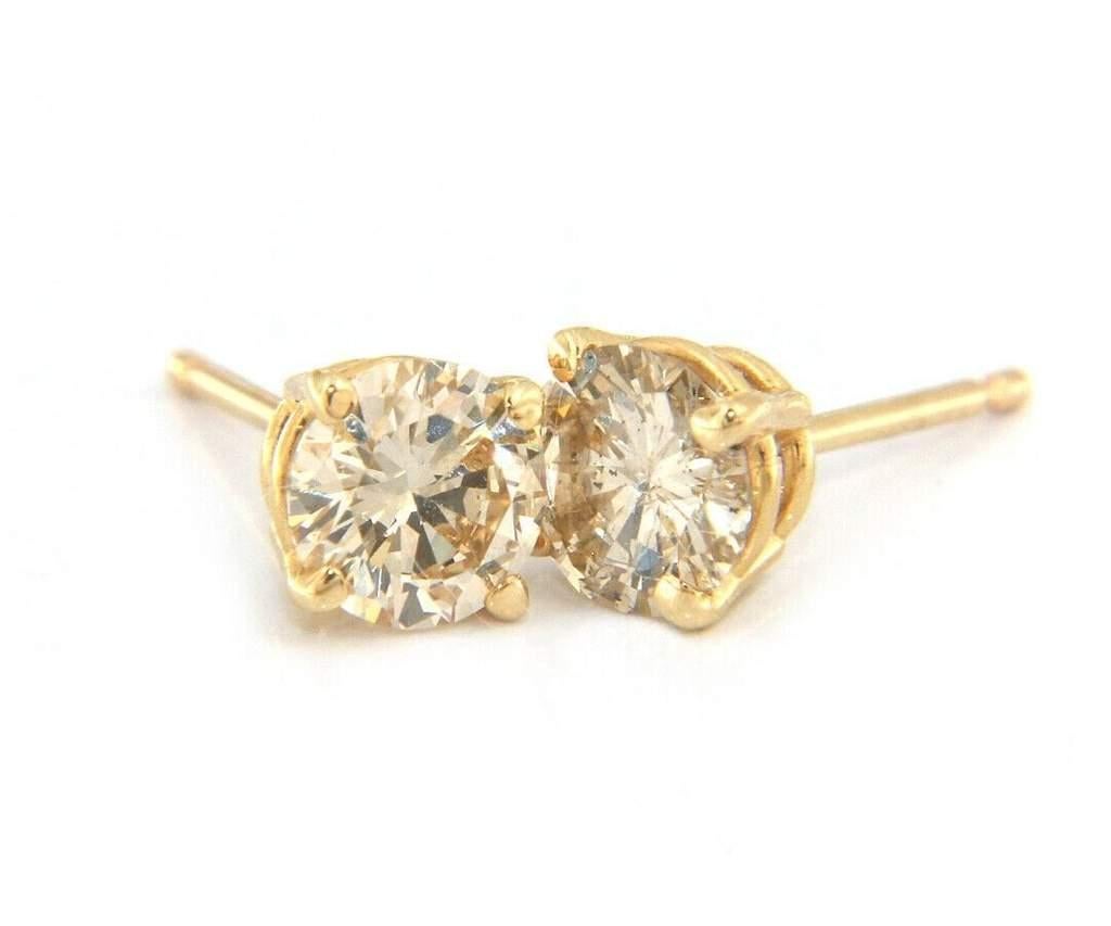 New 0.97ctw Round Brilliant Cut Diamond Solitaire Stud Earrings in 14K 

Round Brilliant Cut Diamond Solitaire Stud Earrings
14K Yellow Gold
Diamonds Carat Weight: Approx. 0.97ctw
Clarity: I1 - I2
Color: L
Weight: Approx. 0.90 Grams
Stamped: