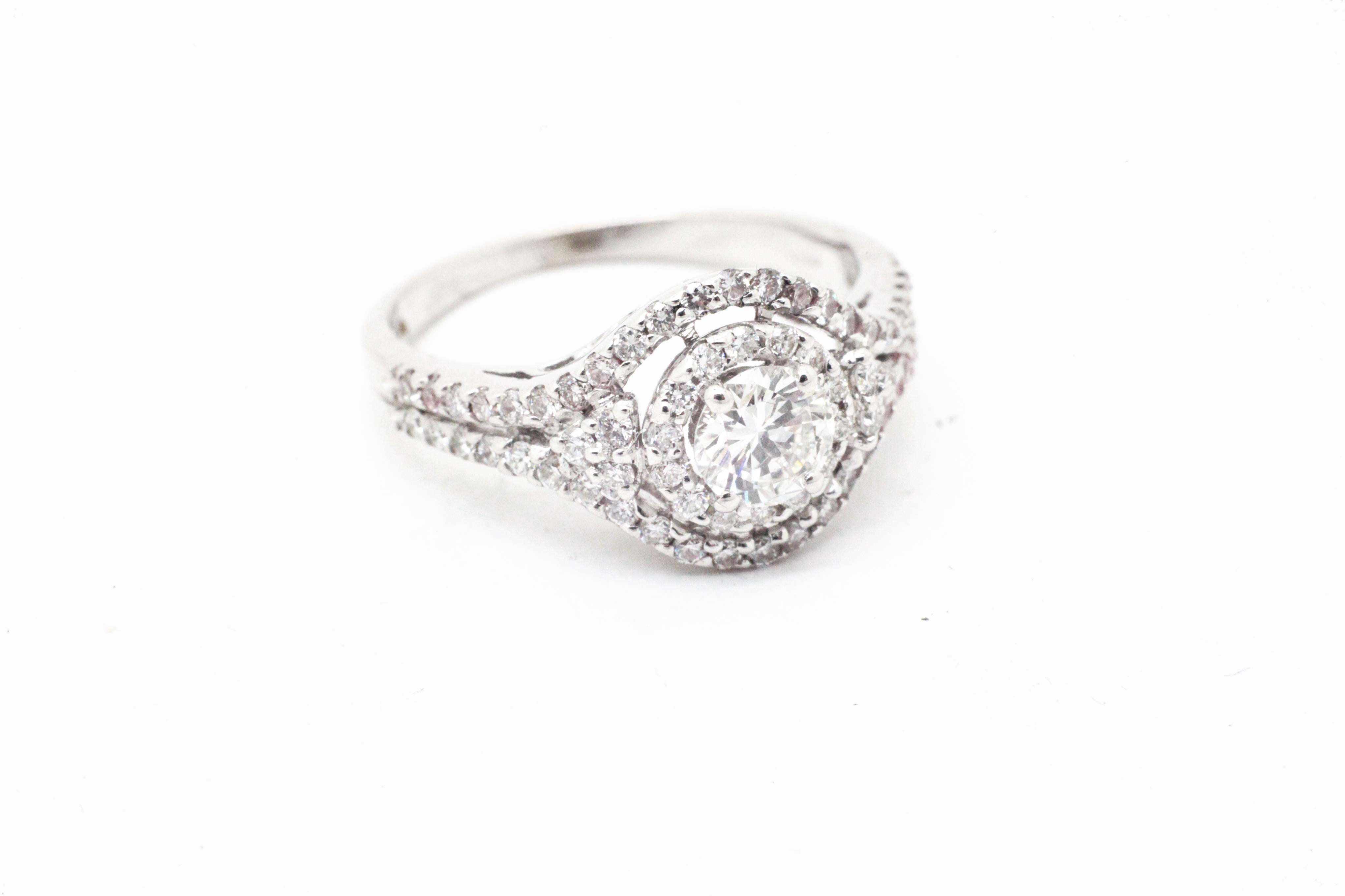 Diamond ring conceived in 18k white gold, showcasing clear white diamonds for a total carat weight of 0.98 carats, hand crafted in Italy,

SIze 6 complimentary adjustable upon order
