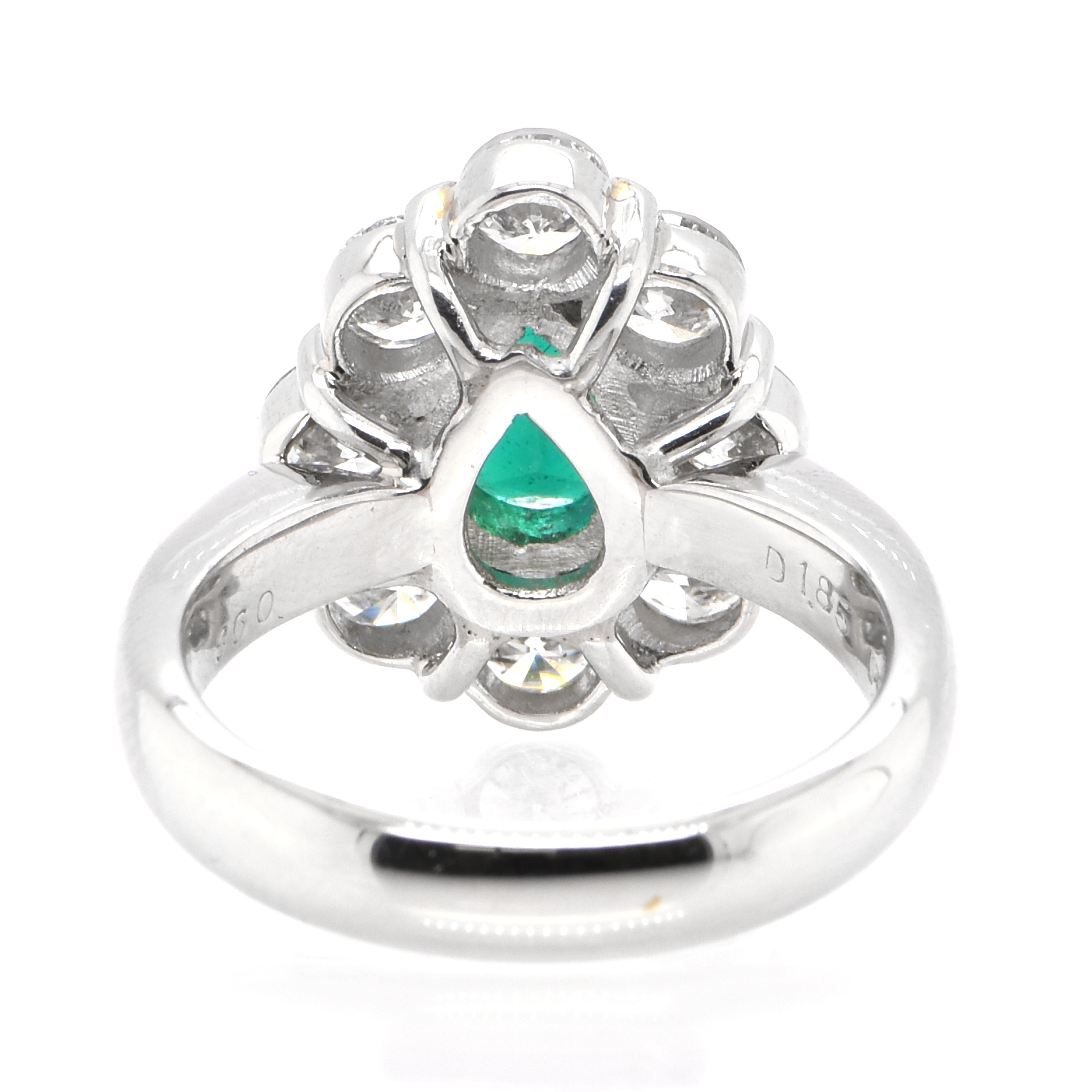 Women's 0.98 Carat Natural Pear-Shaped Emerald and Diamond Ring Set in Platinum For Sale