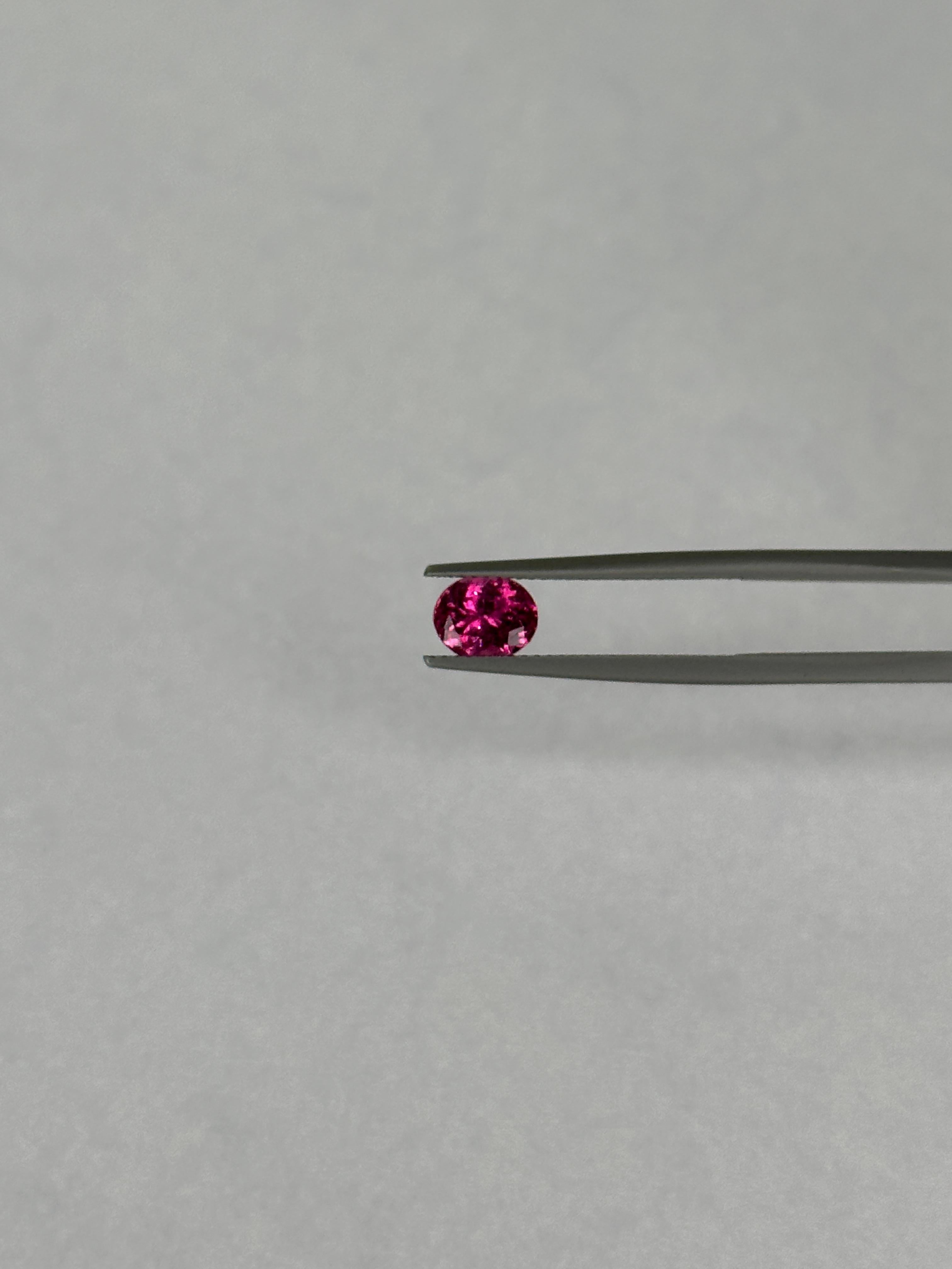 A wonderful Rubellite Tourmaline with an intense pink color from the famous Umba River located in the great African nation, Tanzania.

ID #: TRMC282
Weight: 0.98 Carats
Shape: Oval
Crown: Modified Brilliant
Pavilion: Modified Brilliant
Gem