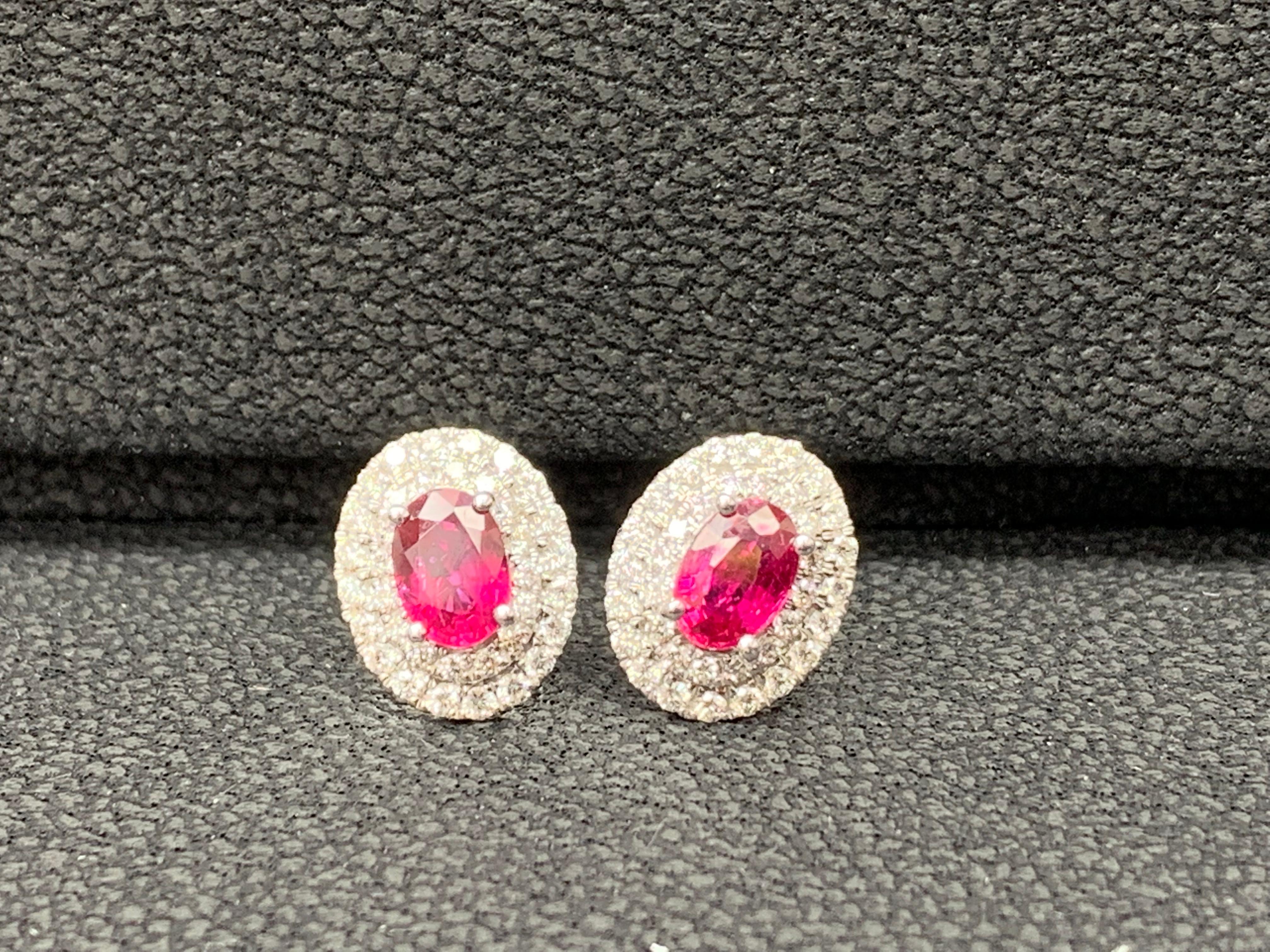 0.98 Carat Oval Cut Ruby and Diamond Stud Earrings in 18K White Gold In New Condition For Sale In NEW YORK, NY