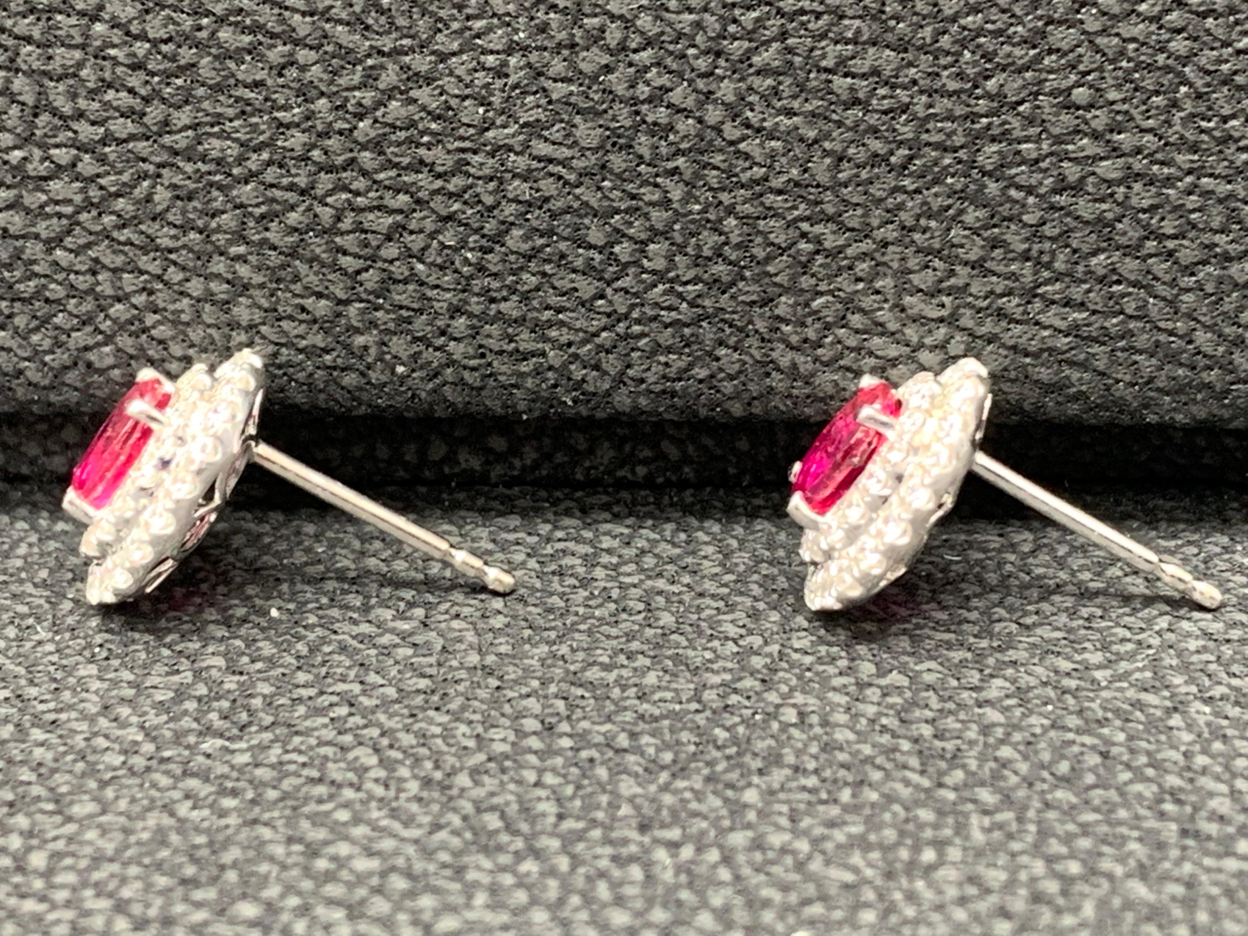 Women's 0.98 Carat Oval Cut Ruby and Diamond Stud Earrings in 18K White Gold For Sale