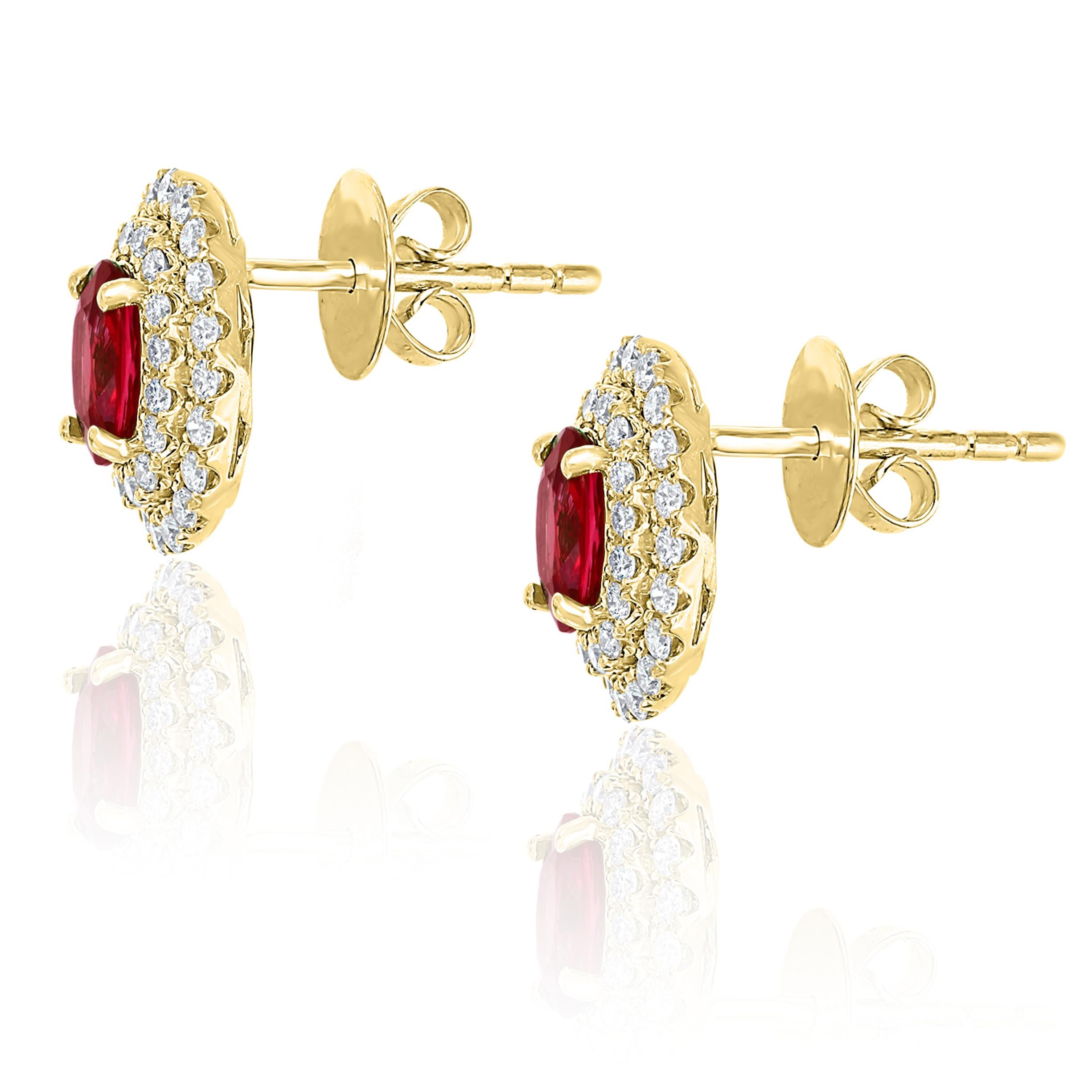 Contemporary 0.98 Carat Oval Cut Ruby and Diamond Stud Earrings in 18K Yellow Gold For Sale