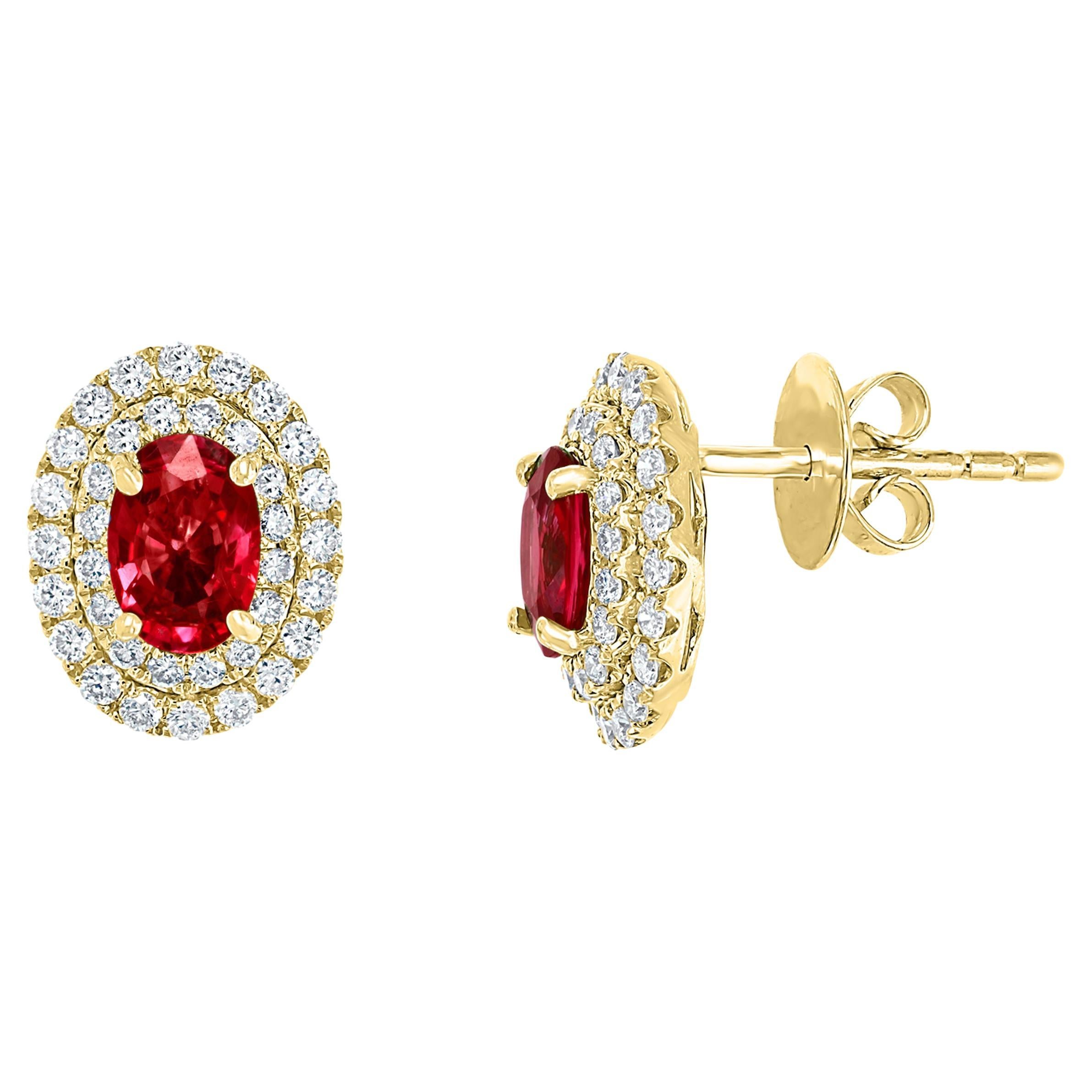 Clous d'oreilles en or jaune 18 carats avec diamants et rubis taille ovale de 0,98 carat