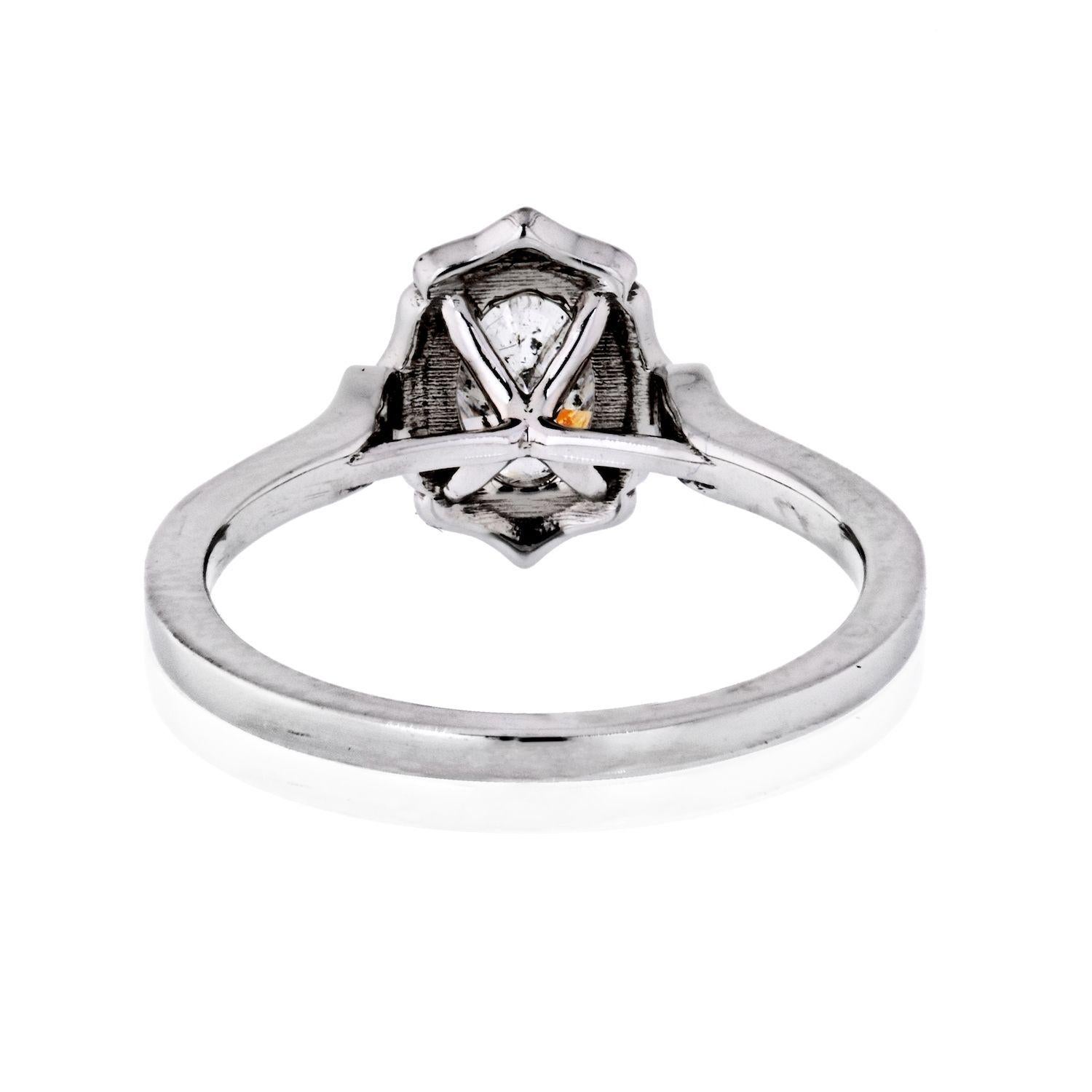 Modern 0.98 Carat Oval Diamond Engagement Ring