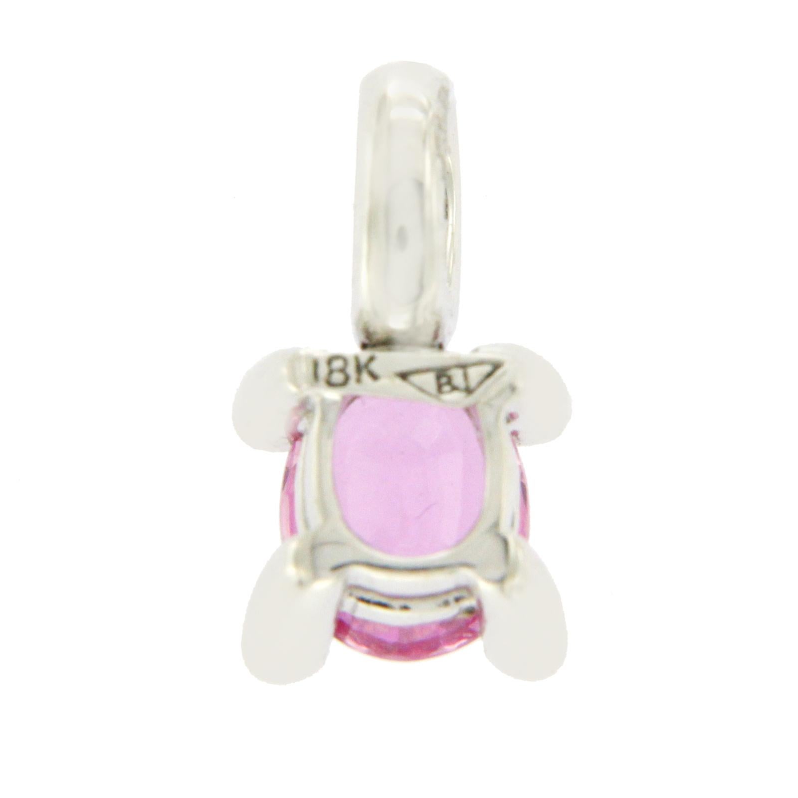 Type: Pendant
Height: 13 mm
Width: 7 mm
Metal: White Gold
Metal Purity: 18K
Stone Type:0.98 CT Natural Pink Sapphire and 0.06 CT G VS2 Diamonds
Hallmarks: 750
Total Weight: 1.5 Grams
Condition: New
Stock Number: BL17
Estimated Price:$2200