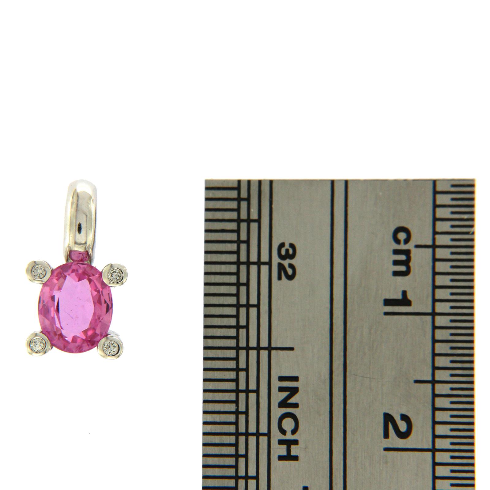 Women's 0.98 Natural Pink Sapphire and 0.06 Carat Diamond in 18 Karat Gold Pendant Charm