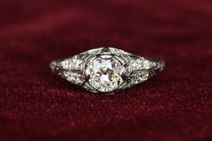0.98 Total Carat Old Mine and Round Cut 1920s Art Deco Filigree Engagement Ring