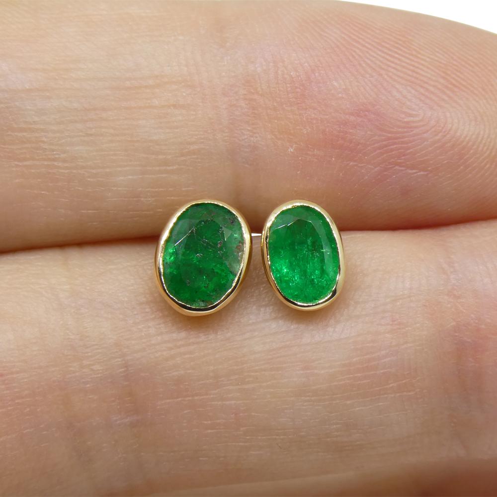 Description:

Stone Type: Emerald
Number of Stones: 2
Weight: 0.98 cts twt
Measurements: 6.59 x 4.76 x 2.47 mm/ 6.16 x 4.18 x 2.53 mm
Shape: Oval
Clarity: Moderately Included: Inclusions visible to the unaided eye, inclusions obvious at 10x