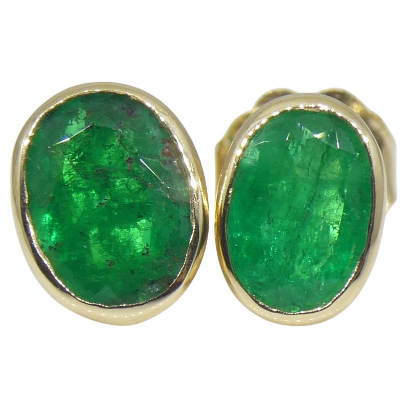 0.98ct Colombian Emerald Stud Earrings set in 14k Yellow Gold For Sale