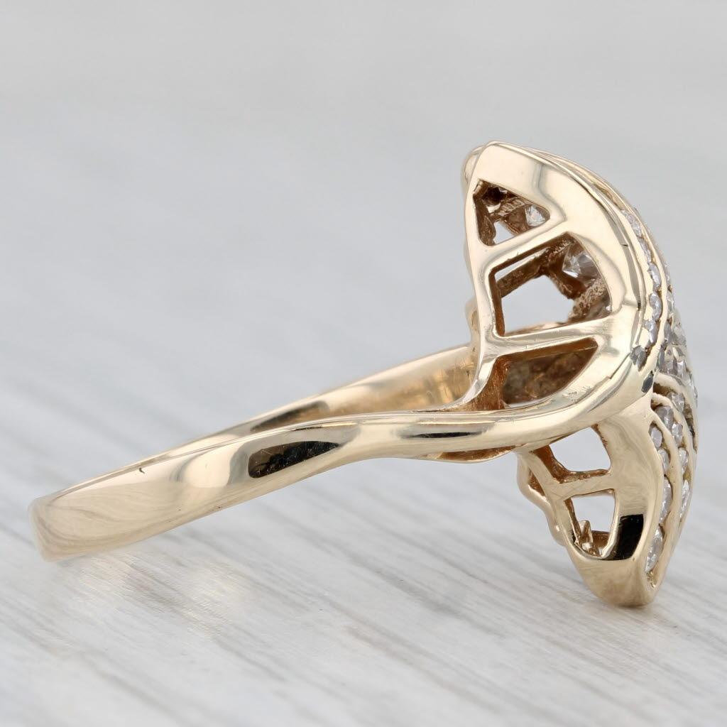 Gemstone Information:
- Natural Diamonds -
Total Carats - 0.98ctw
Cut - Round Brilliant & Single
Color - J - L
Clarity - VS2 - SI1

Metal: 14k Yellow Gold
Weight: 4.3 Grams 
Stamps: 14kp (P is for Plumb for high quality gold)
Face Height: 18.4 mm