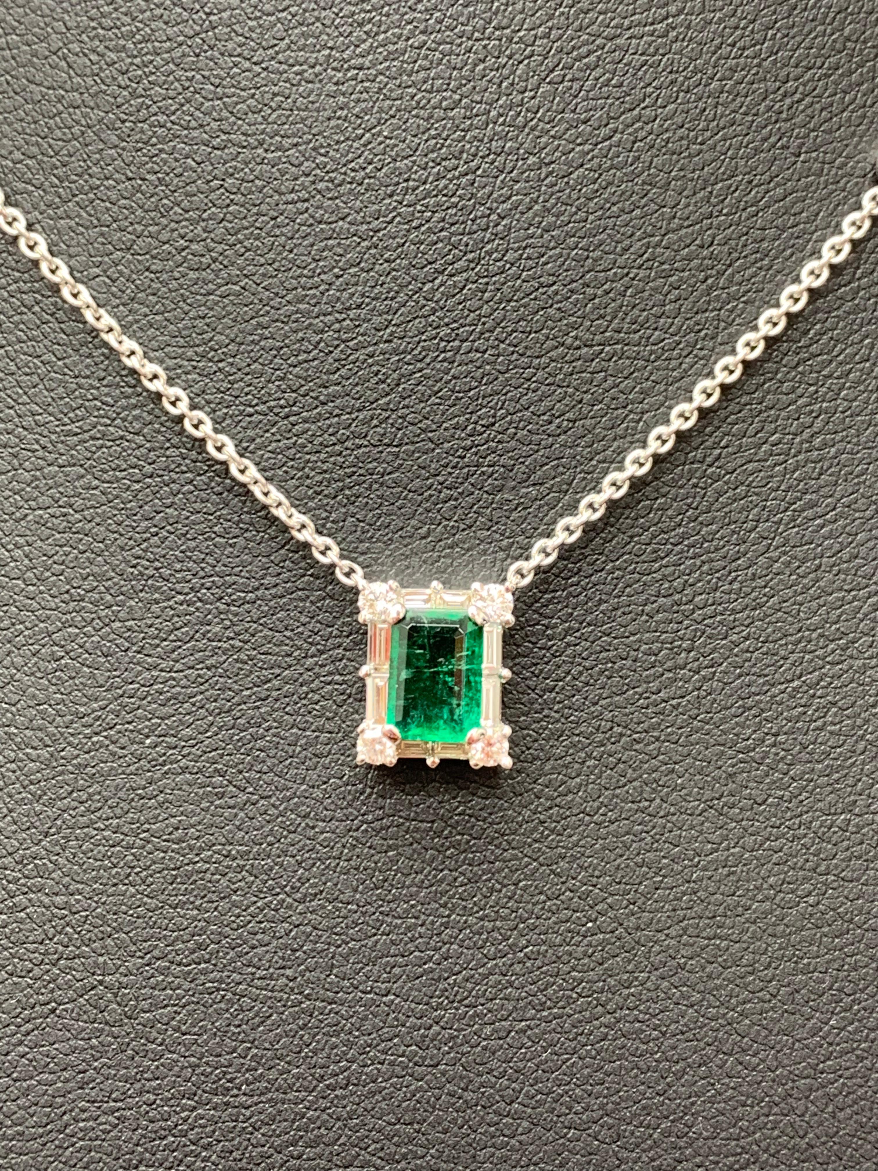 Modern 0.99 Carat Emerald Cut Emerald and Diamond Pendant Necklace in 18K White Gold For Sale