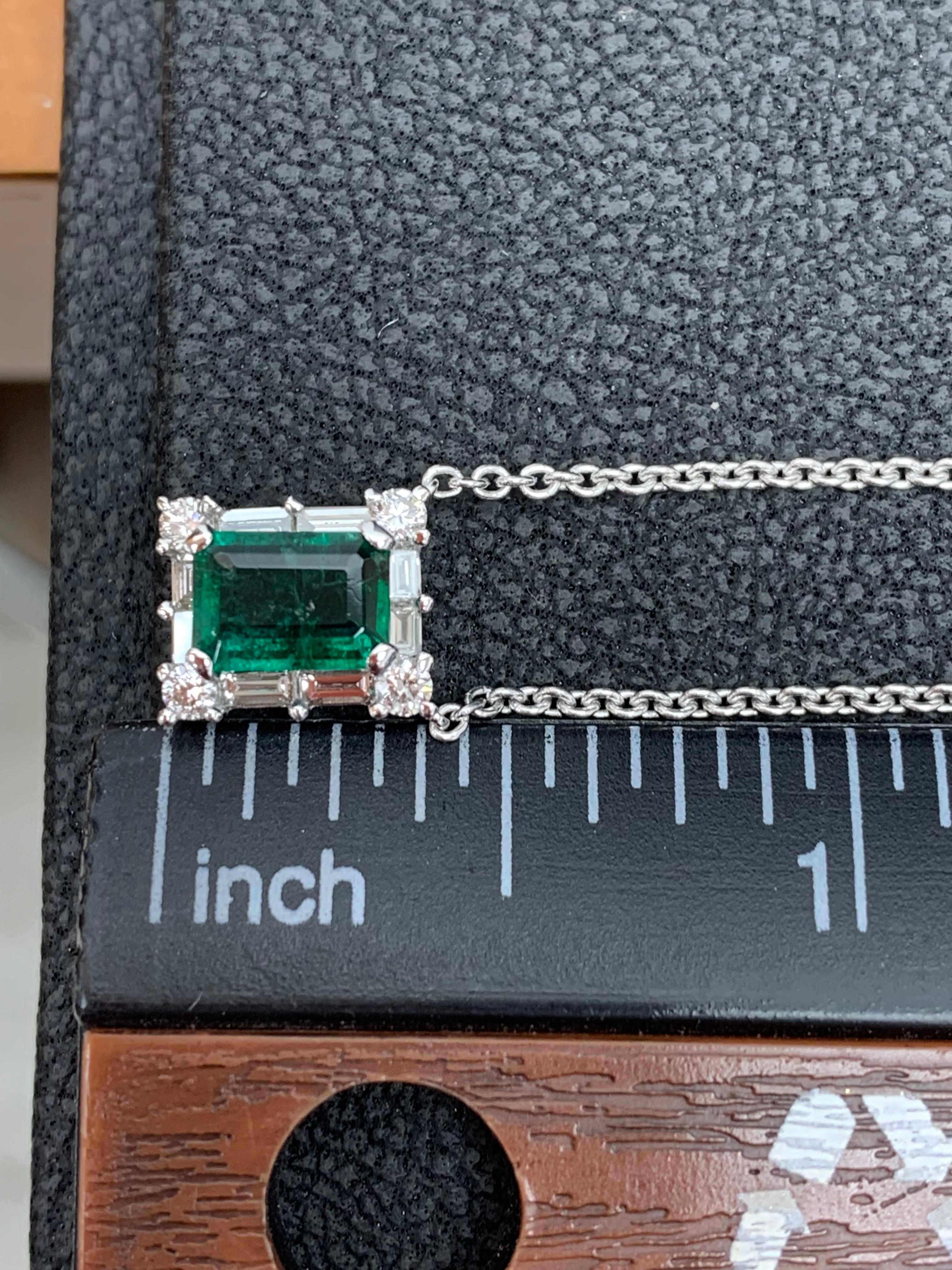 0.99 Carat Emerald Cut Emerald and Diamond Pendant Necklace in 18K White Gold For Sale 1
