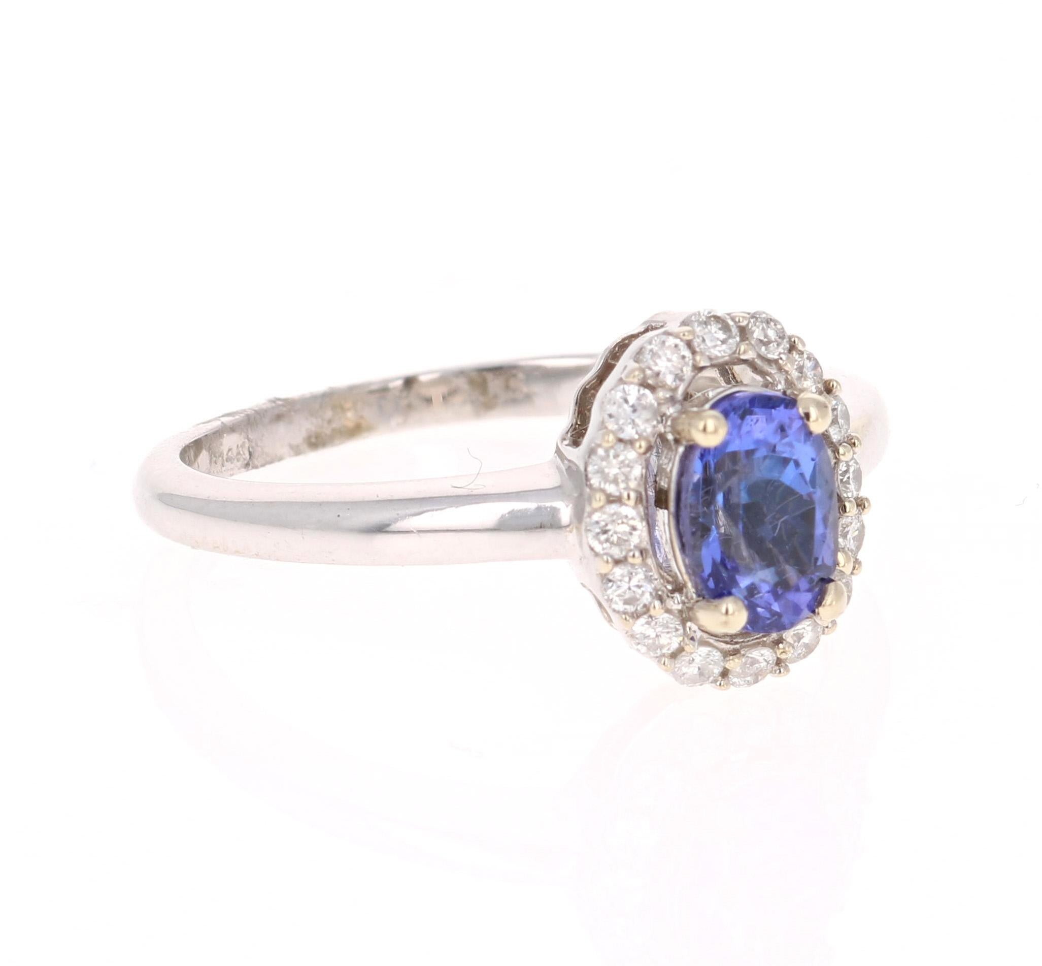 This simple everyday ring can be a promise or friendship ring! 

It has an Oval Cut Tanzanite that weighs 0.77 carats and is adorned with 17 Round Cut Diamonds that weigh 0.22 carats.

It is set in 14 Karat White Gold and weighs approximately 2.7