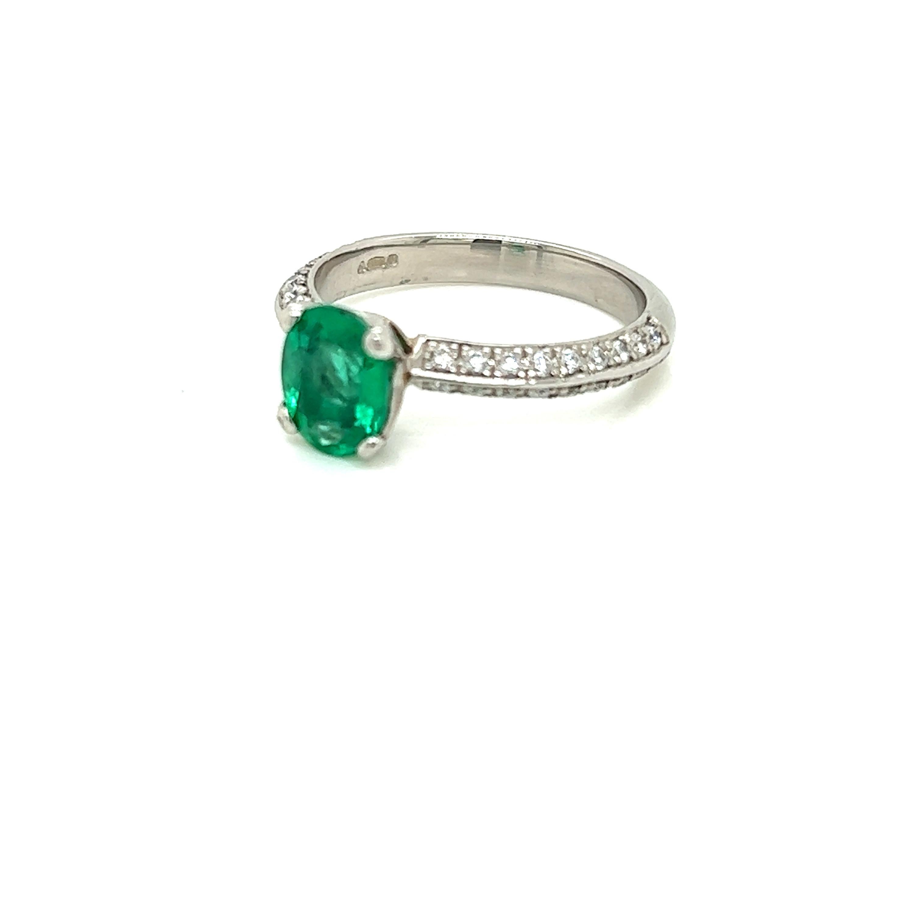 0.99 Carat Oval Emerald and Diamond Ring in Platinum

This spectacular ring features a gorgeous 0.99 carat Oval Emerald held in a claw setting on a Diamond encrusted Platinum band. The round brilliant diamonds on this beauty weigh a total of 0.28