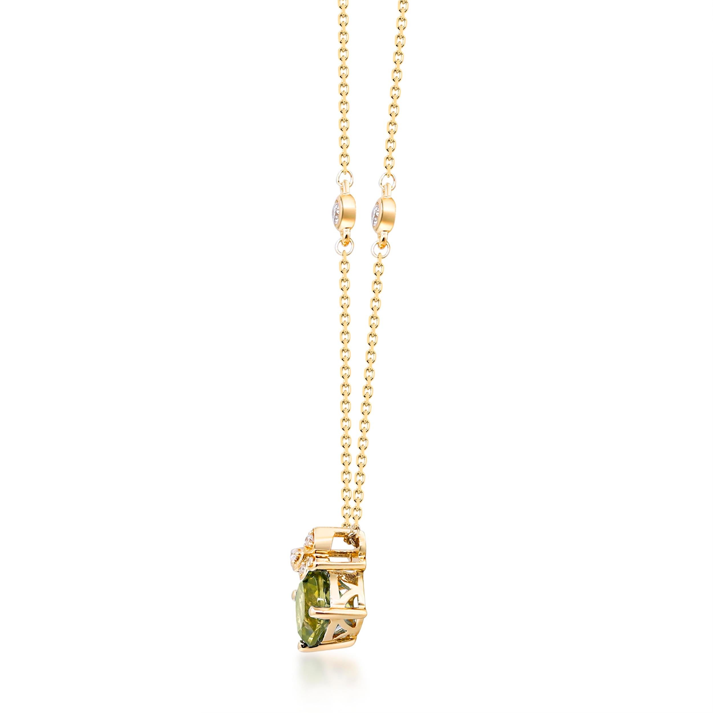 Decorate yourself in elegance with this Pendant is crafted from 10-karat Yellow Gold by Gin & Grace. This Pendant is made up of 6.0 mm Cushion-Cut Peridot (1 pcs) 0.99 carat and Round-cut White Diamond (4 Pcs) 0.02 Carat. This Pendant is weight 1.86