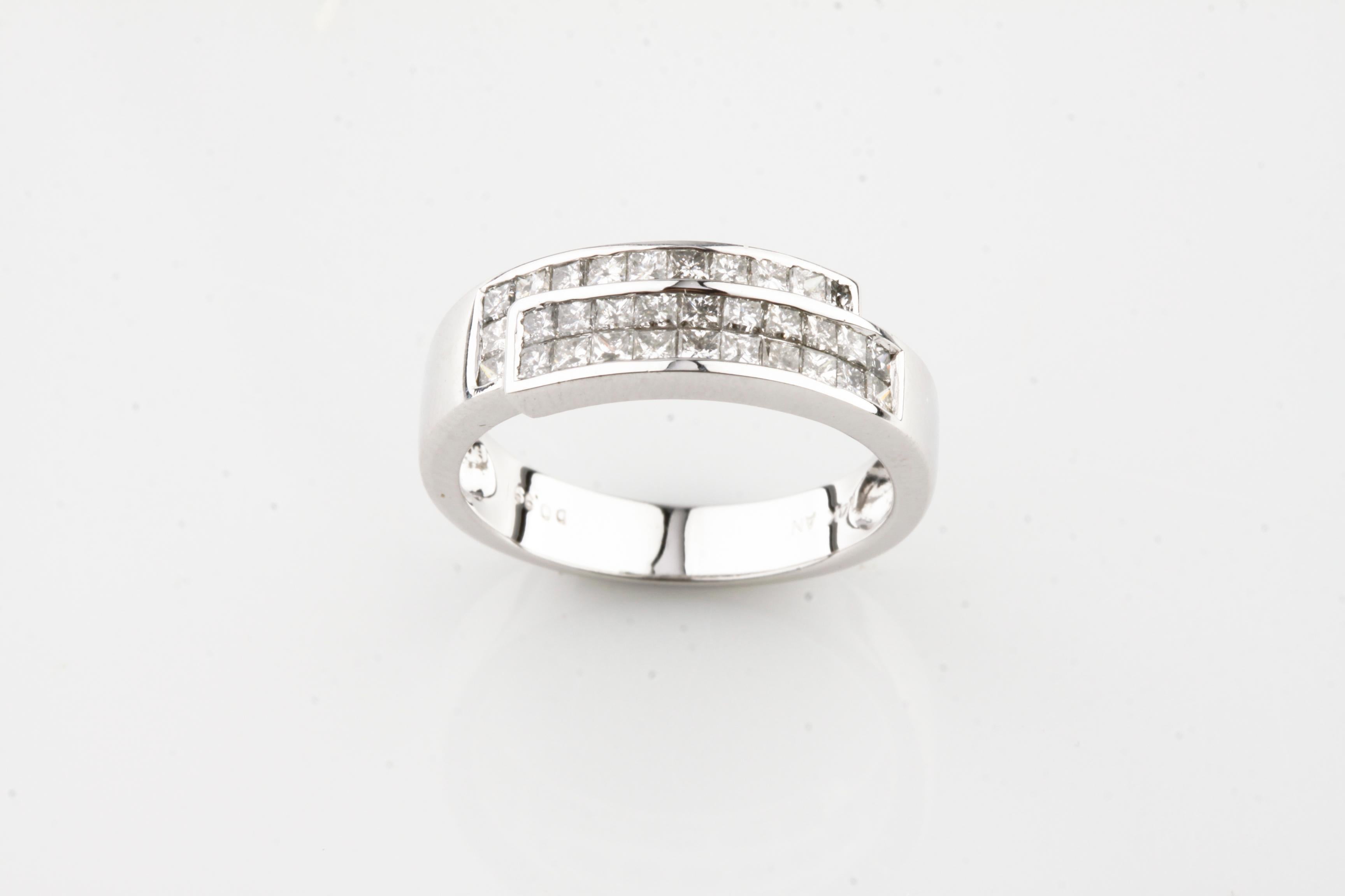 Gorgeous Princess Diamond Plaque Ring
Features Princess Cut Invisible Set Diamond in Terraced Plaques
Total Diamond Weight = Appx 0.99 ct
Size 7.25
Total Mass = 4.0 grams
Gorgeous Gift!