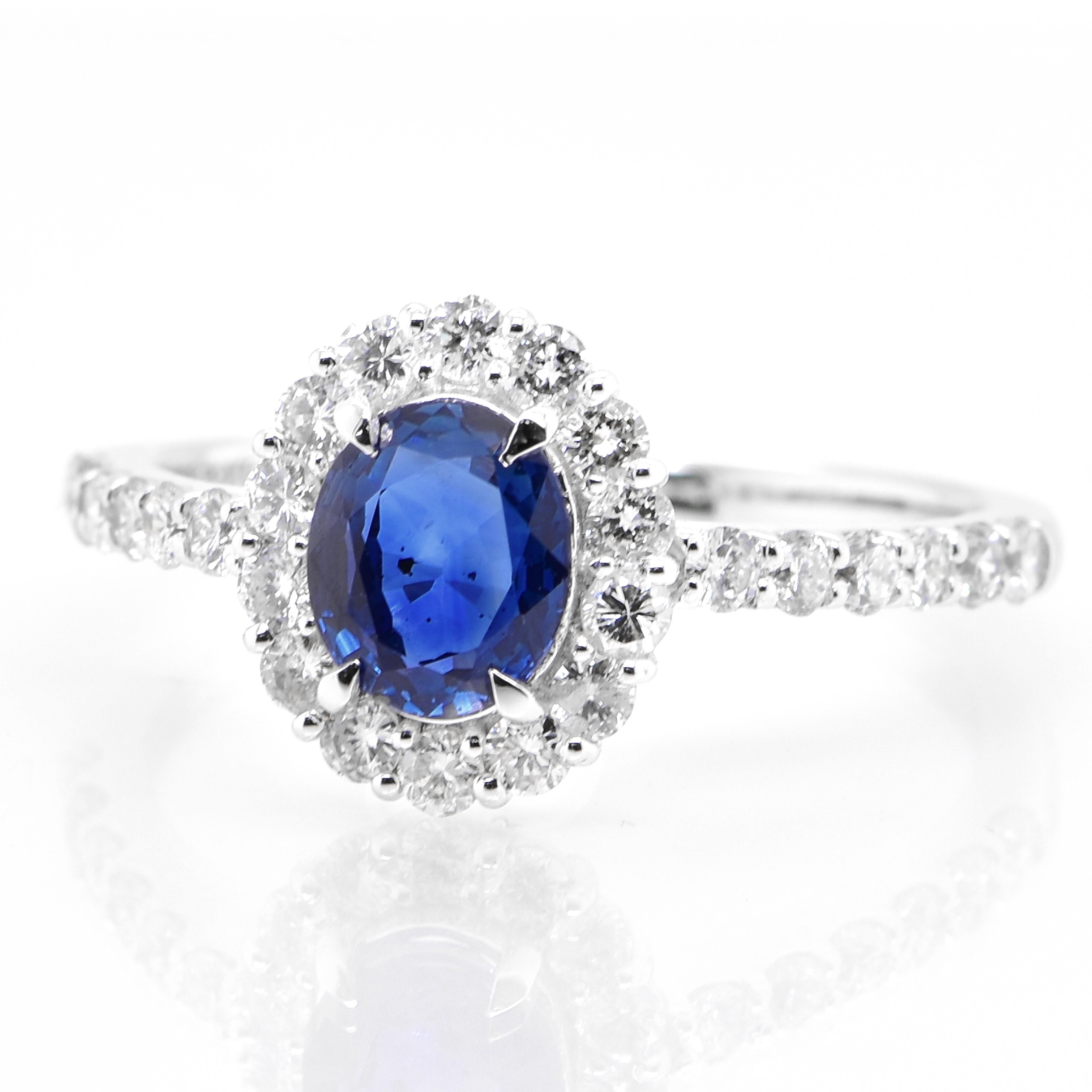 A beautiful ring featuring AIGS Certified 0.99 Carat Natural Cornflower Blue, Unheated Sapphire and 0.56 Carats Diamond Accents set in Platinum. Sapphires have extraordinary durability - they excel in hardness as well as toughness and durability