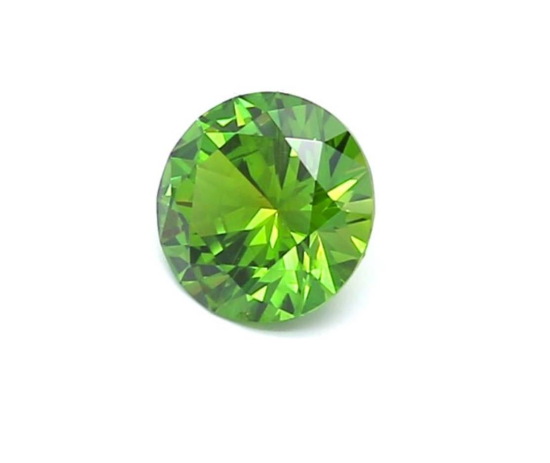 Ural Mountains of Russia is the most important and consistent source of the rarest variety of Garnets - Demantoid.  
The stones from this region are famous for their vivid green hue, high dispersion, and characteristic horsetail inclusion.  

This