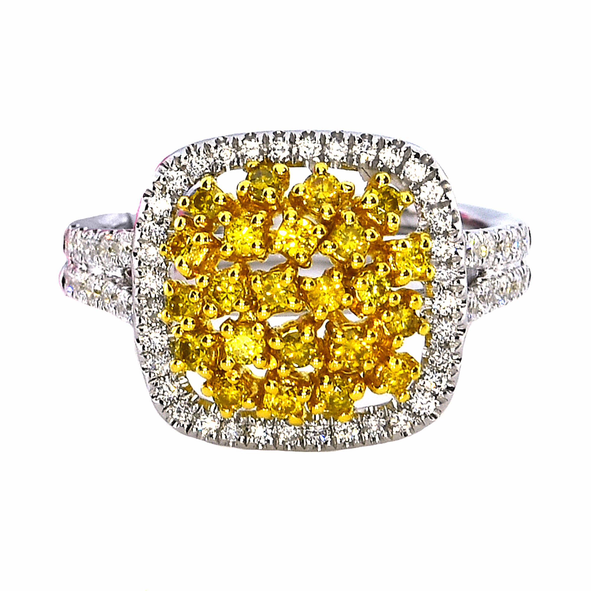 Stylish Fancy Intense Yellow and White Diamond Cluster Ring
Total Carat Weight: 0.99 Carats (total 22 stones)
White Diamonds: 0.56 Carats (total 64 stones)
Yellow Diamonds: 0.43 Carats (total 22 stones)
Setting: 6.44 grams, 18k White Gold