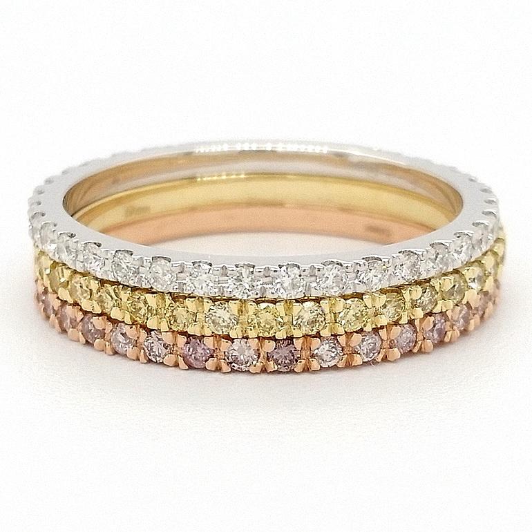 These three color pink, yellow and white gold 14kt rings, weighing in total of 3.54 gr, each set with 31 mixed pink, mix yellow and white round brilliant cut diamonds, totaling 0.99 carats, are designed very uniquely and conveniently as you will