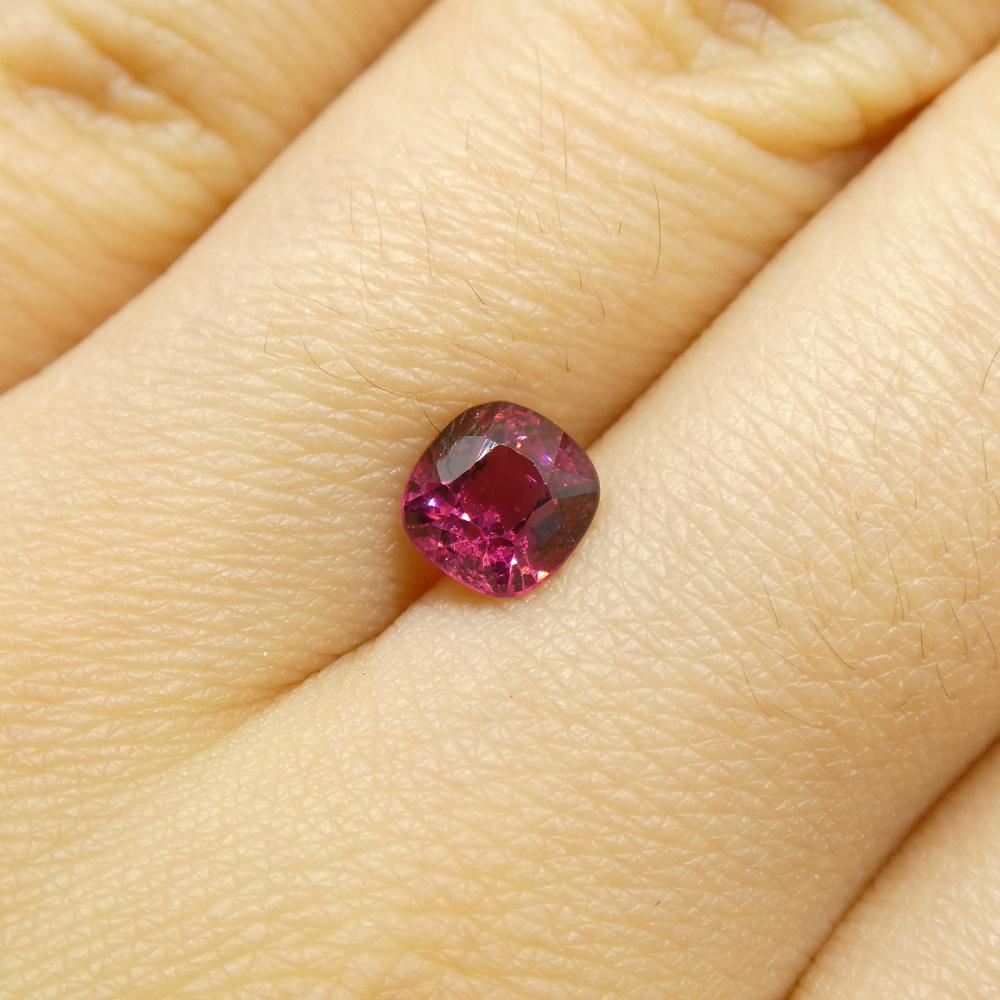 Description:

Gem Type: Jedi Spinel 
Number of Stones: 1
Weight: 0.99 cts
Measurements: 5.65 x 5.41 x 4.03 mm
Shape: Cushion
Cutting Style Crown: Brilliant Cut
Cutting Style Pavilion: Step Cut 
Transparency: Transparent
Clarity: Very Slightly