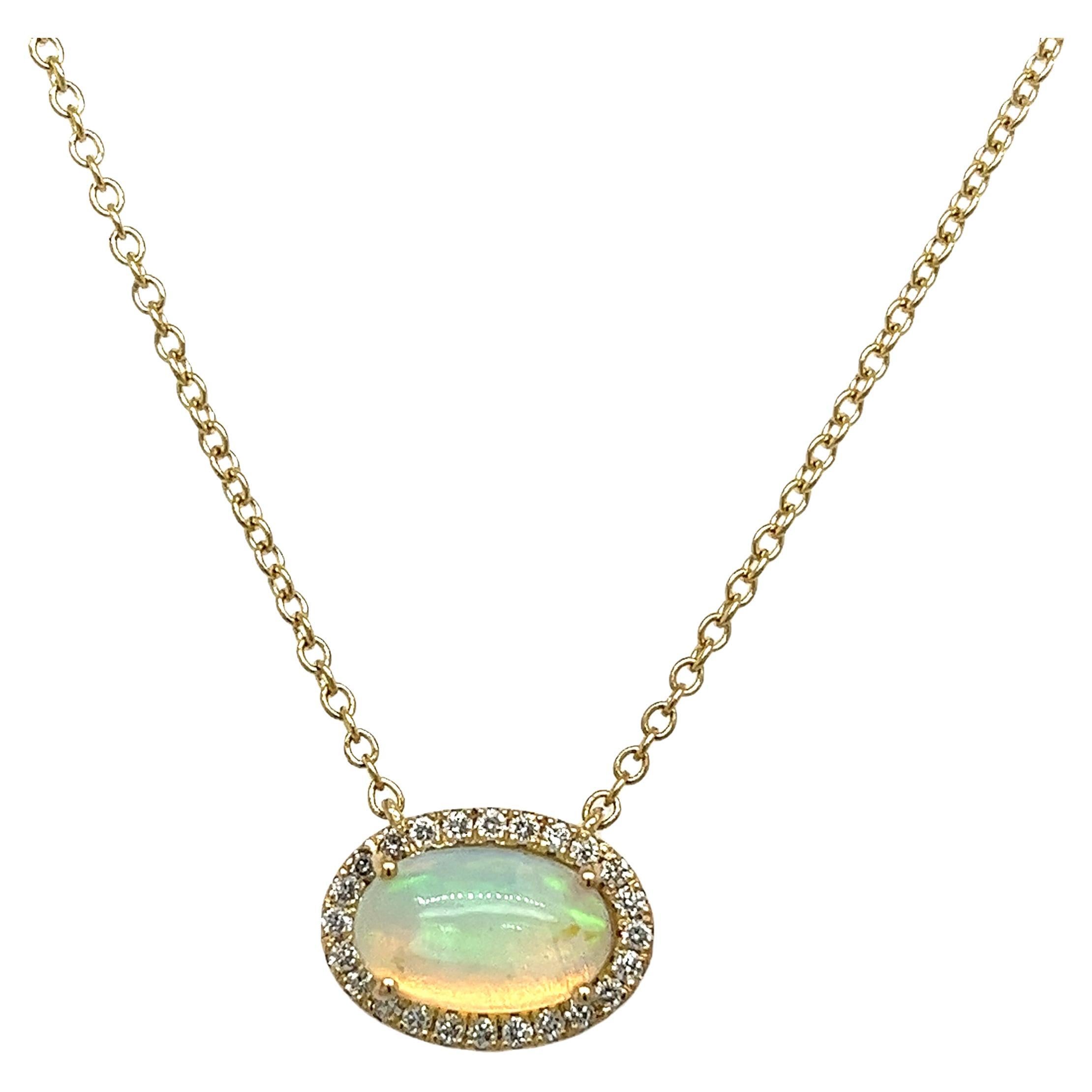 0.99ct Oval Opal & Diamonds Pendant Set in 18ct Yellow Gold