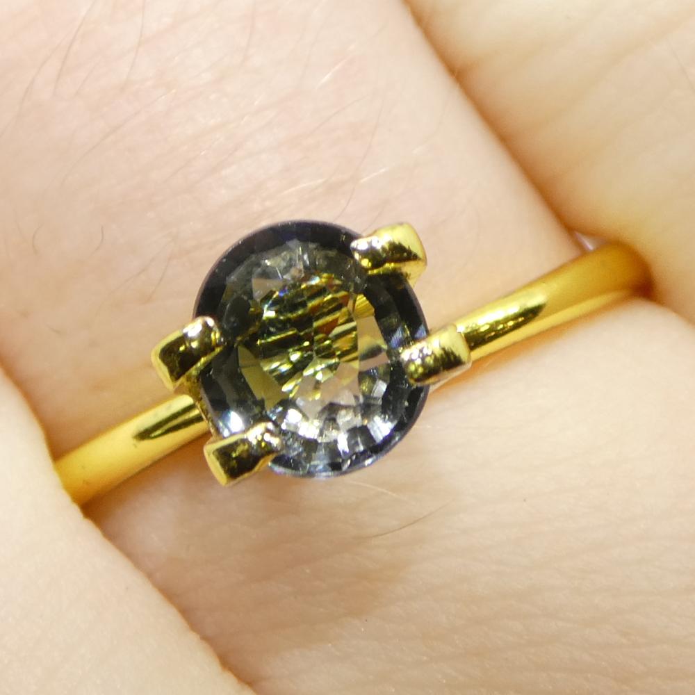 Description:

Gem Type: Sapphire 
Number of Stones: 1
Weight: 0.99 cts
Measurements: 6.68 x 6.01 x 3.50 mm
Shape: Oval
Cutting Style Crown: Modified Brilliant Cut
Cutting Style Pavilion: Step Cut 
Transparency: Transparent
Clarity: Very Very
