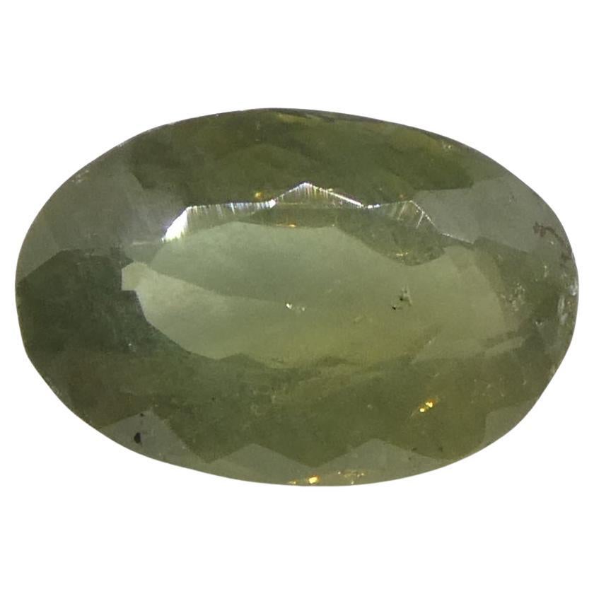 0.99 ct Alejandrita ovalada verde amarillenta a marrón amarillenta de Brasil