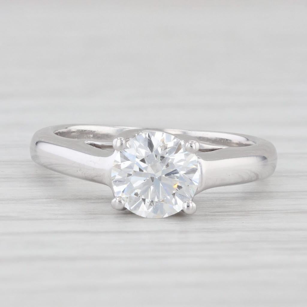 Gemstone Information:
- Natural Diamond -
Carats - 0.99ct 
Cut - Round Brilliant
Color - G
Clarity - SI2
Laser Engraved - IGI302627B

Metal: 14k White Gold, Platinum
Weight: 4 Grams 
Stamps: Plat 14k
Face Height: 6.3 mm 
Rise Above Finger: 7.1