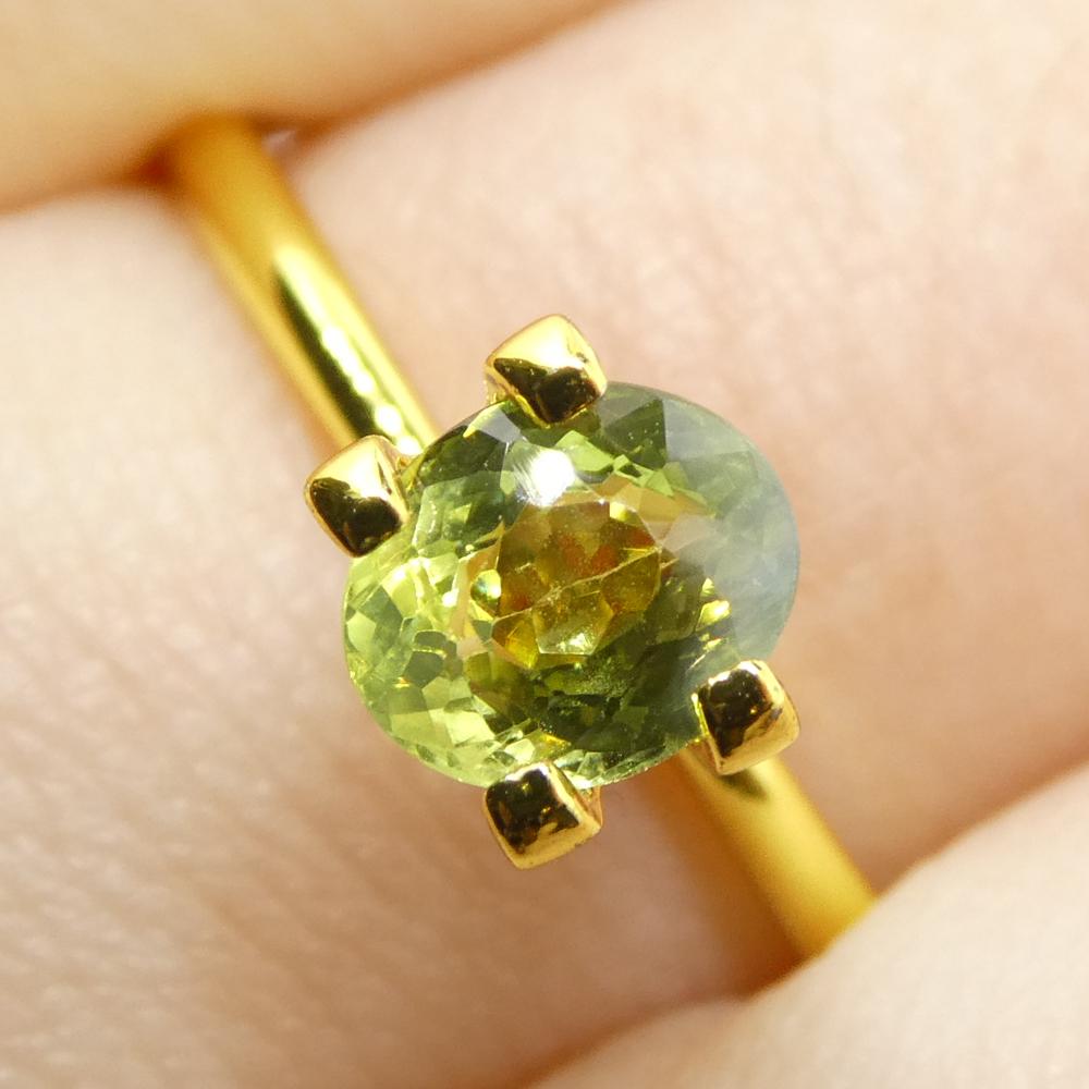 Brilliant Cut 0.9ct Oval Yellowish Green to Greenish Yellow Alexandrite from Sri Lanka For Sale