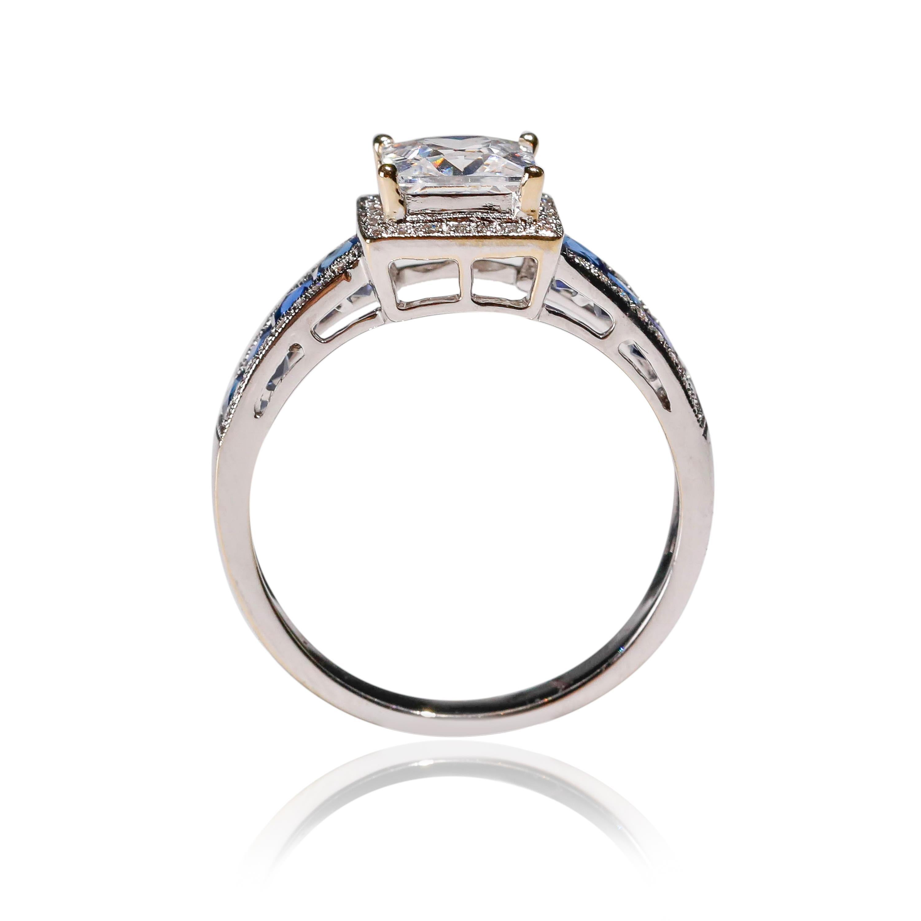 New Art Deco Style 0.17 Ct Diamond 0.9 carat Sapphire Solitaire 18k White Gold Engagement Ring

Crafted in 18kt White Gold, this Unique design showcases a Blue Sapphire 0.9 TCW, set in a halo of round-cut mesmerizing diamonds, Polished to a