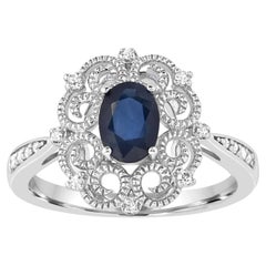 1-1/10 ct. Ring aus Sterlingsilber mit blauem Saphir im Ovalschliff und Diamant-Akzent