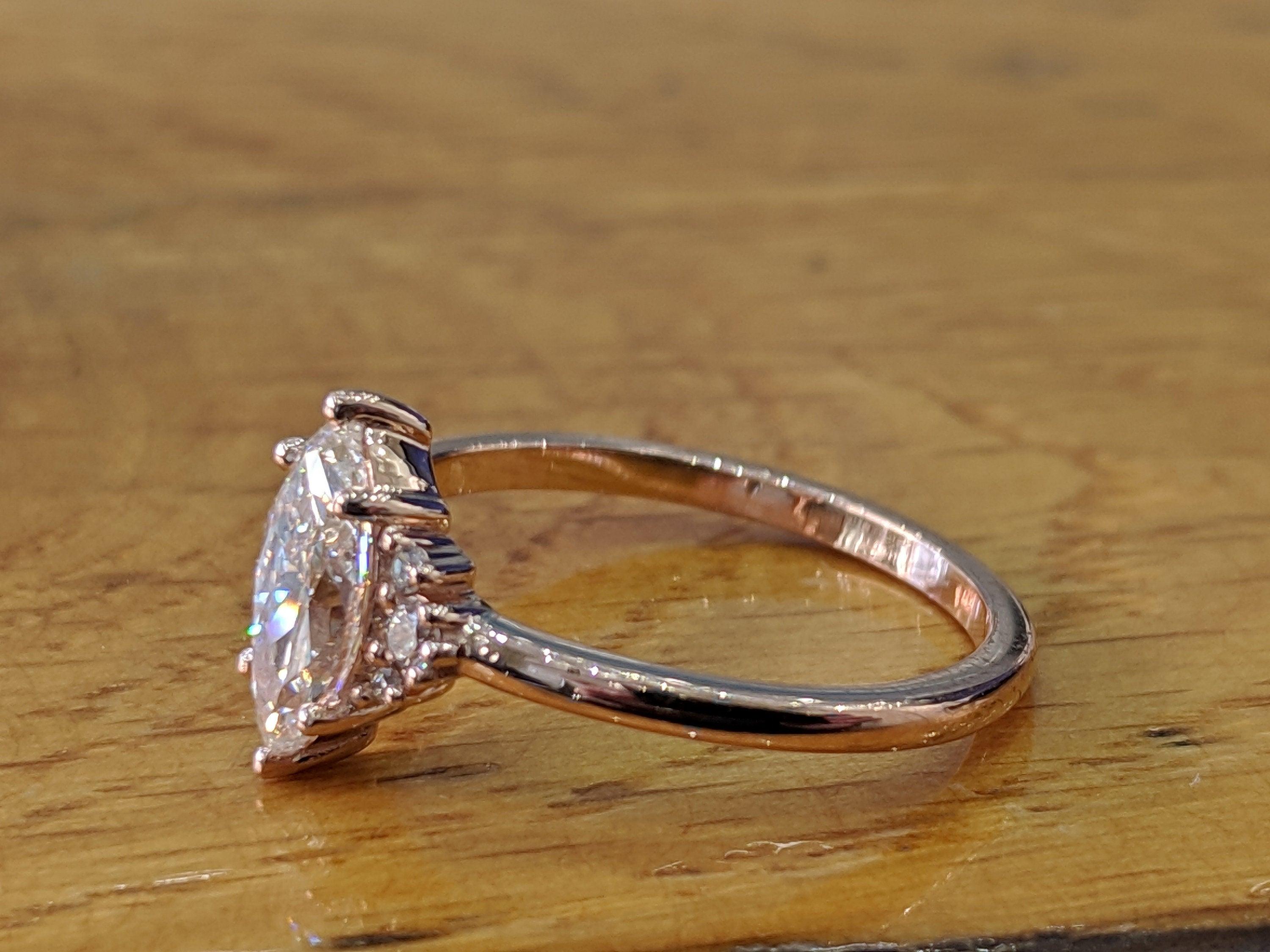 rose gold marquise engagement rings