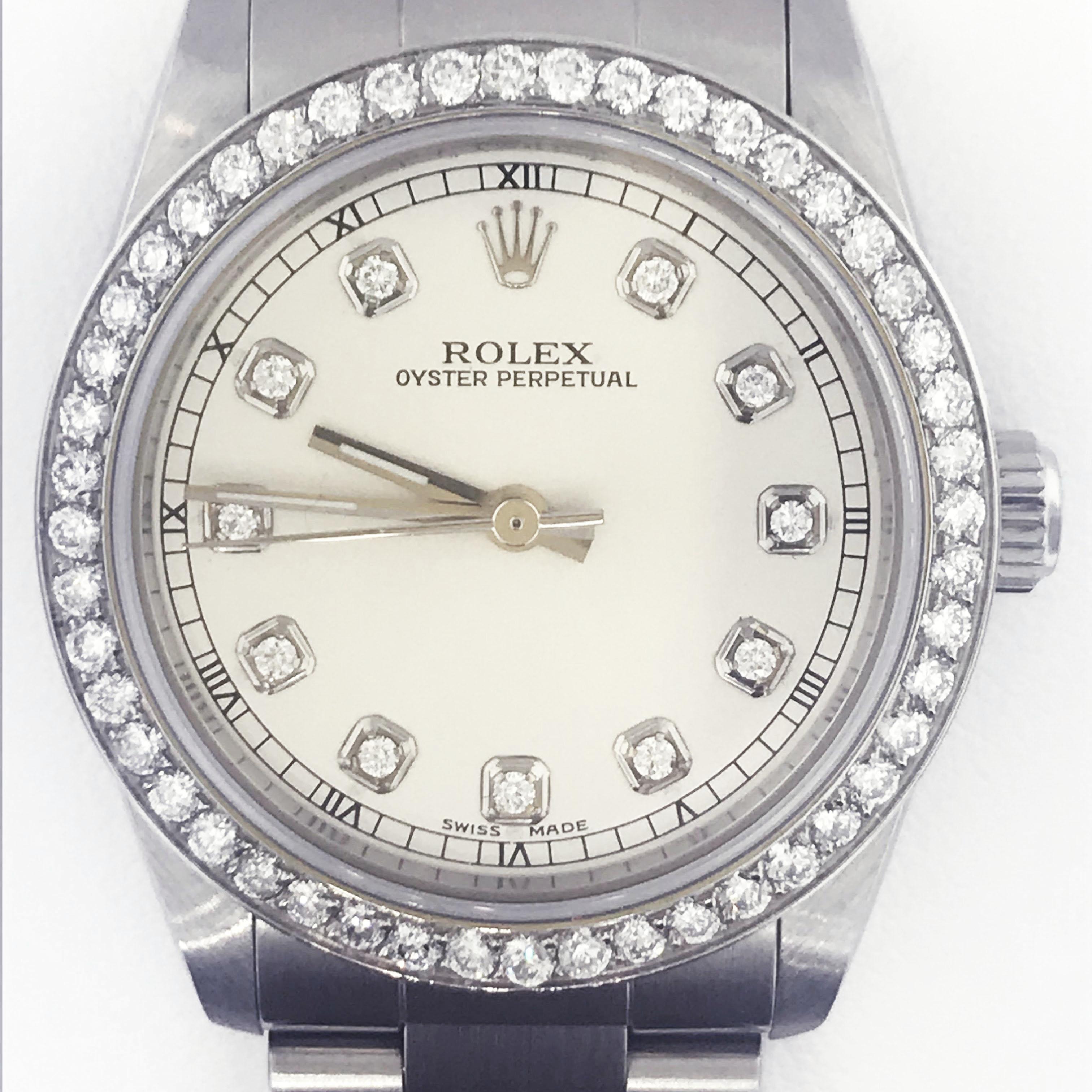 Ladies Diamond Rolex 

This stunning diamond Rolex is in fantastic condition! With a smooth polish finish the stainless steel Rolex watch looks good with all attired on any day. The additional sparkle cannot be ignored, with 48 round brilliant