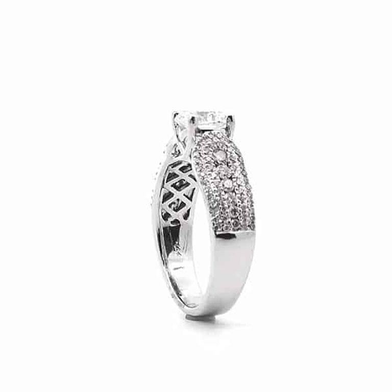 Find the perfect engagement ring for your special moment. This stunning cluster engagement ring is a completed piece, ready for purchase. It features a dazzling center stone—an EGL-certified 1.07-carat round diamond, graded H in color and SI3 in