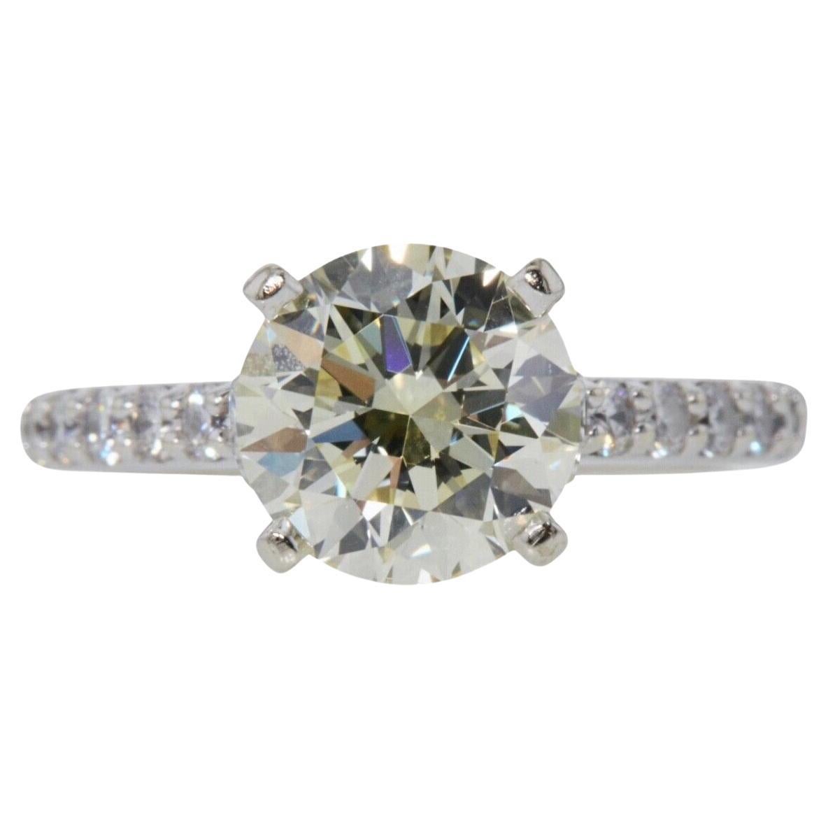 Bague de fiançailles en or 14 carats avec halo de diamants solitaires ronds naturels de 1 1/3 carat en vente