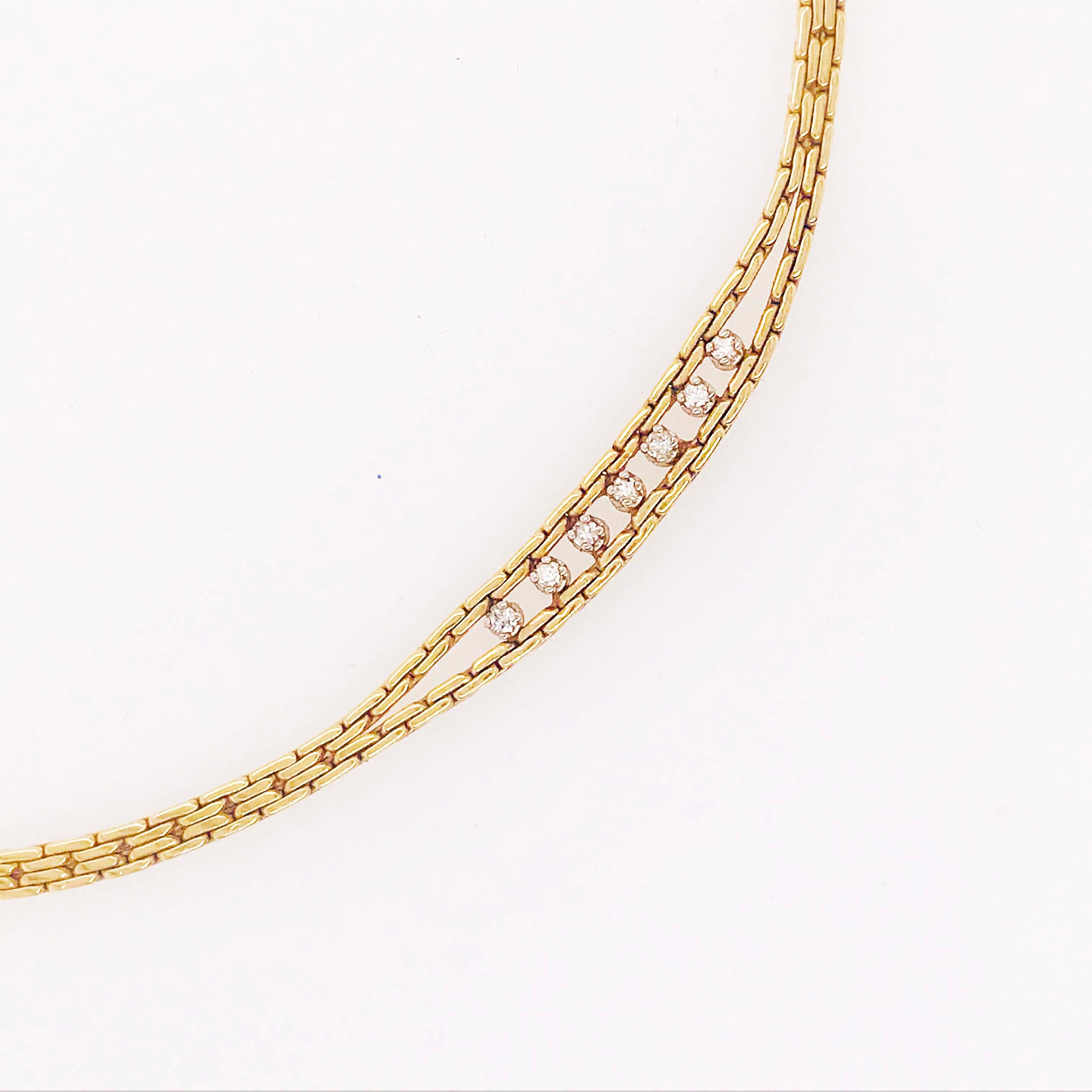 The diamond chain necklace has a distinctive design that's gorgeous and bold. The chain necklace is a flat custom chain with handmade links that are 3mm wide. The chain parts towards the bottom in an open, crescent moon shape. In the part there are