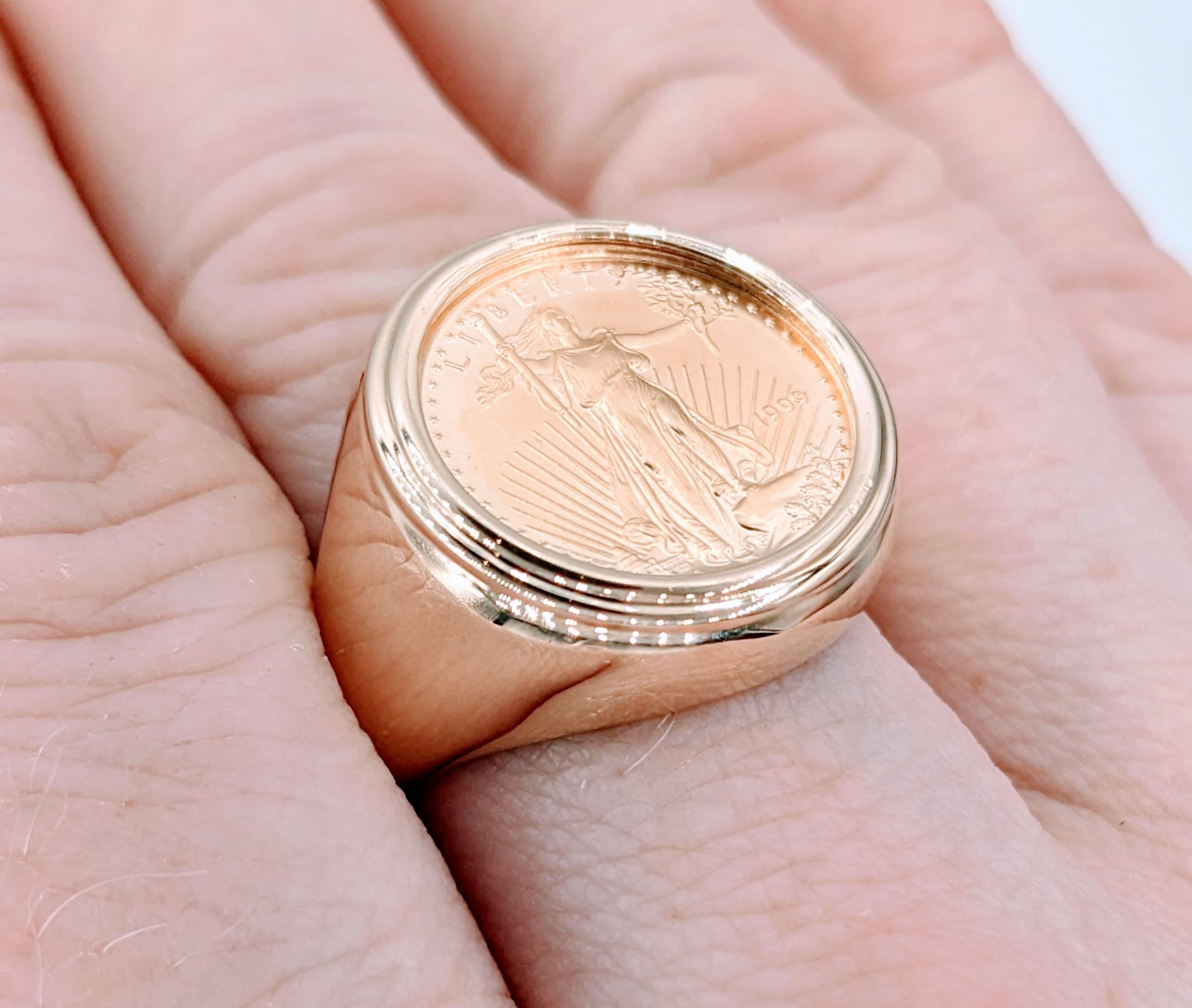 1/10 Gold Eagle Yr. 1999 Coin Ring

Introducing this captivating ring, meticulously crafted in 14k yellow gold. This beautiful piece features a remarkable 1/10 Gold Eagle Coin from the year 1999, adding a touch of prestige and historical