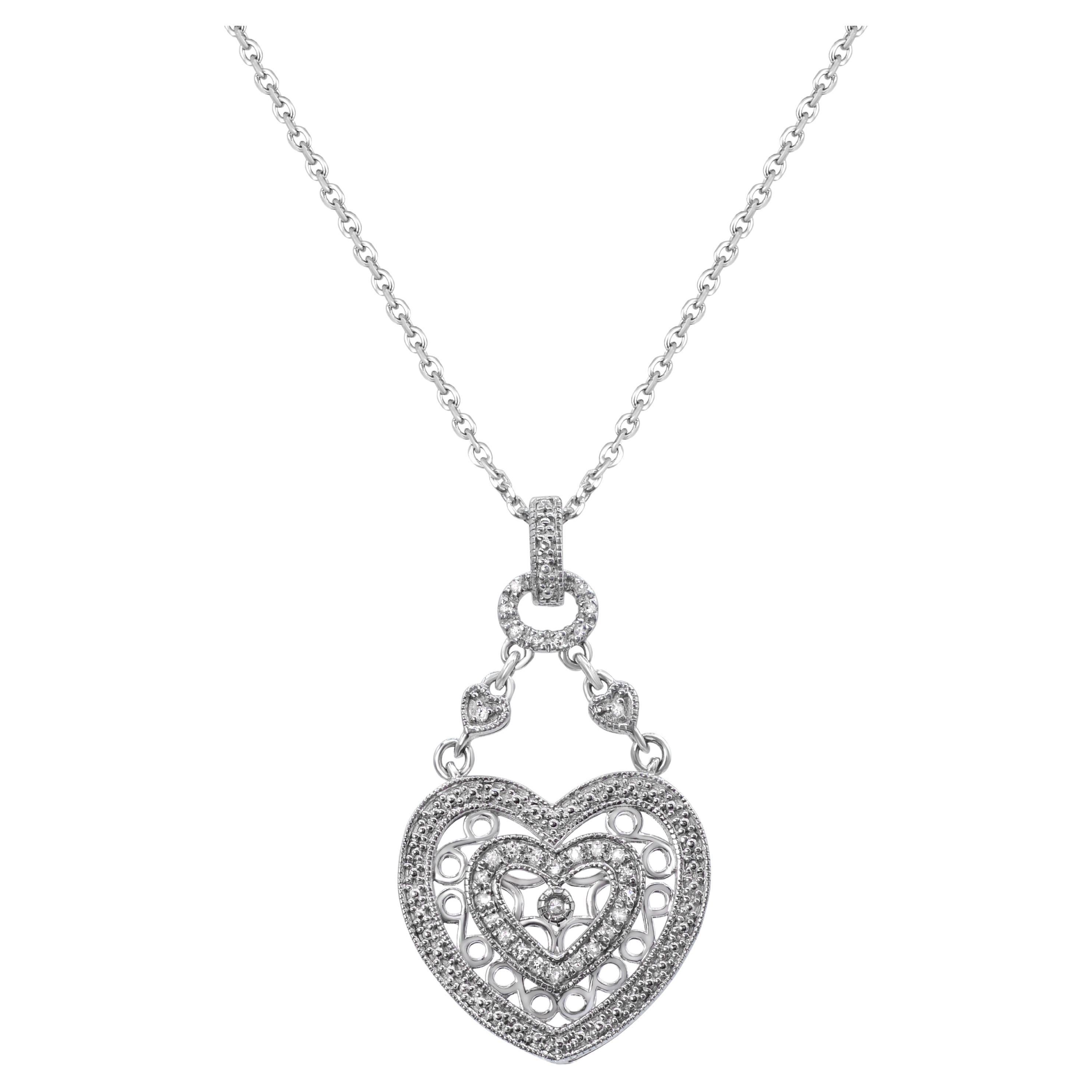 1/10ct. Collier pendentif double cœur en argent sterling orné de diamants en vente