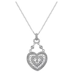 1/10ct. Collier pendentif double cœur en argent sterling orné de diamants