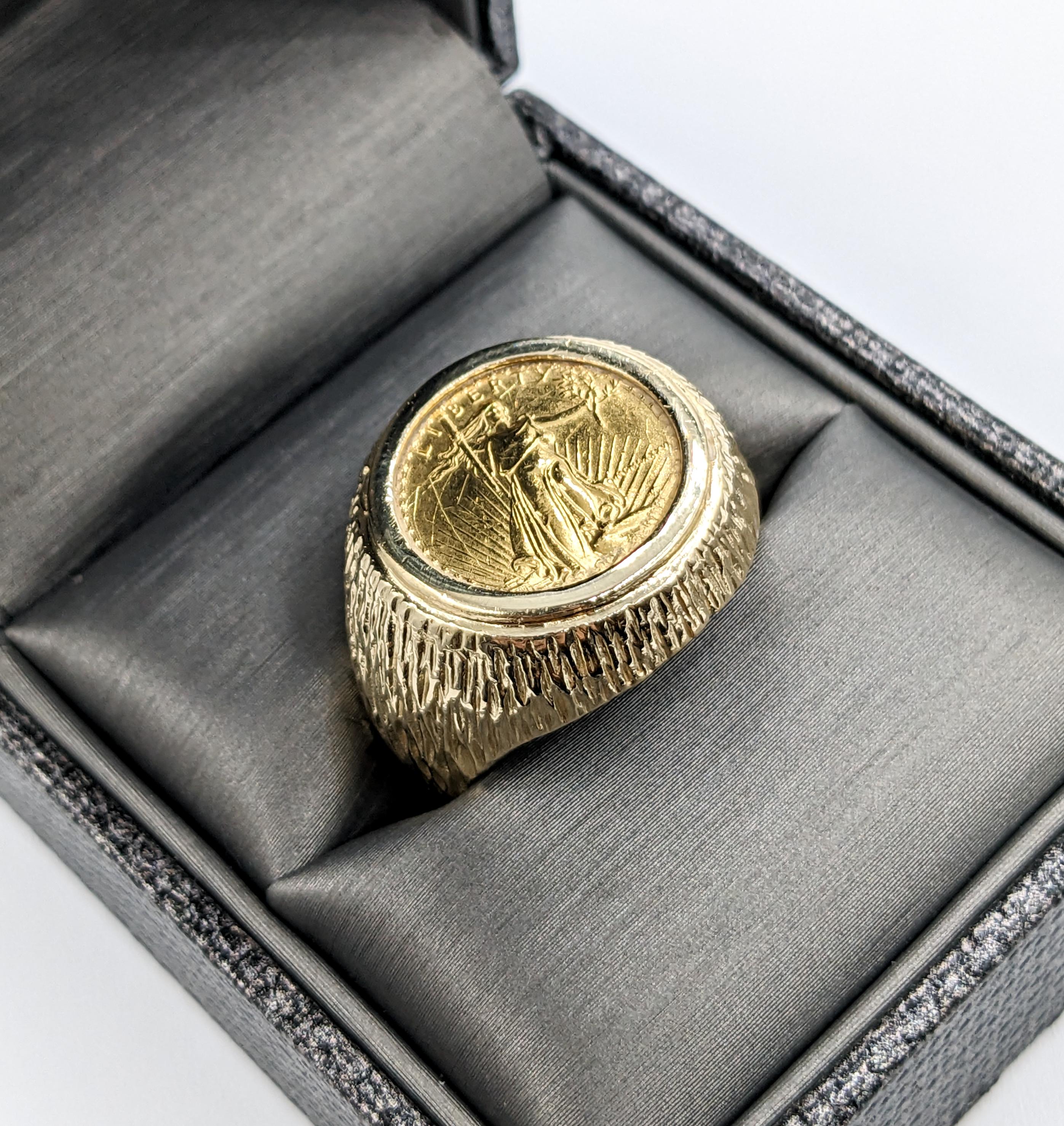 1/10th 2009 Liberty Gold Coin Bezel Set Ring

Introducing our exquisite ring, a seamless blend of traditional elegance and contemporary style, meticulously crafted in 14k yellow gold. This piece prominently features a 1/10th Liberty Gold coin,