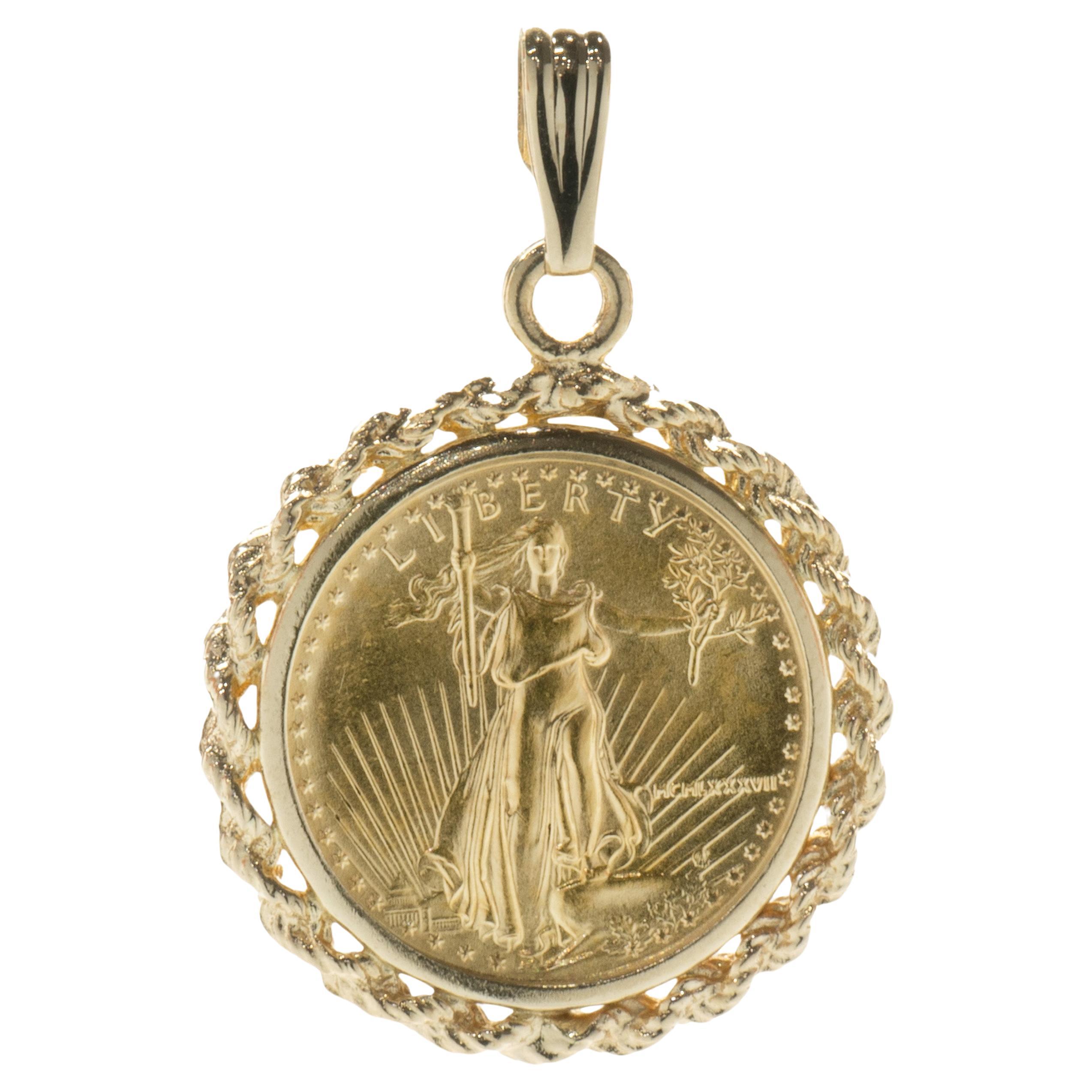 1 / 10th Liberty Coin in 14 Karat Yellow Gold Bezel