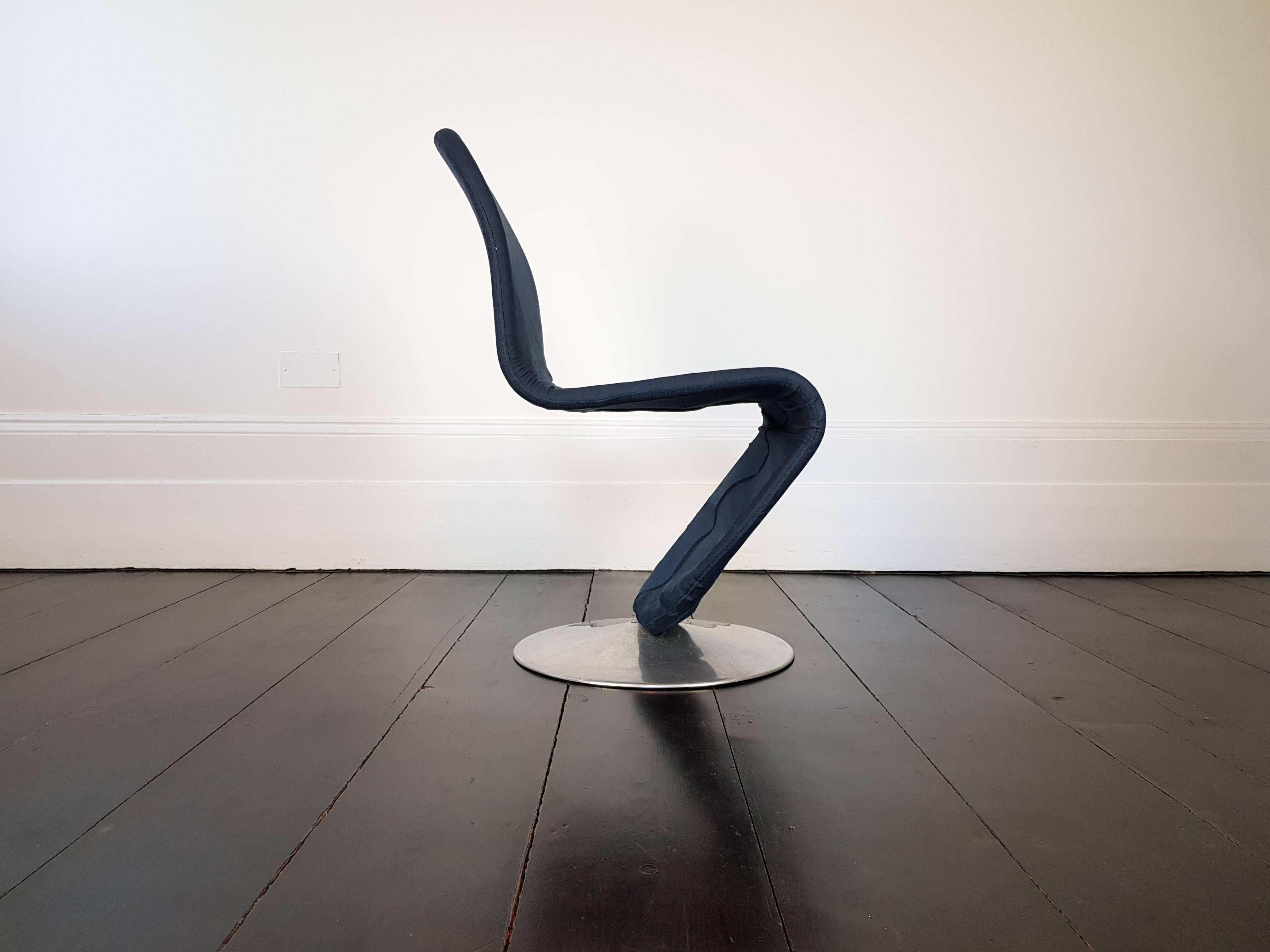 An easy chair from the 1-2-3 series designed by Danish designer Verner Panton in 1973, this piece produced by Rosenthal in the 1980s.

Recovered in a blue stretch denim.
 
  
 

      