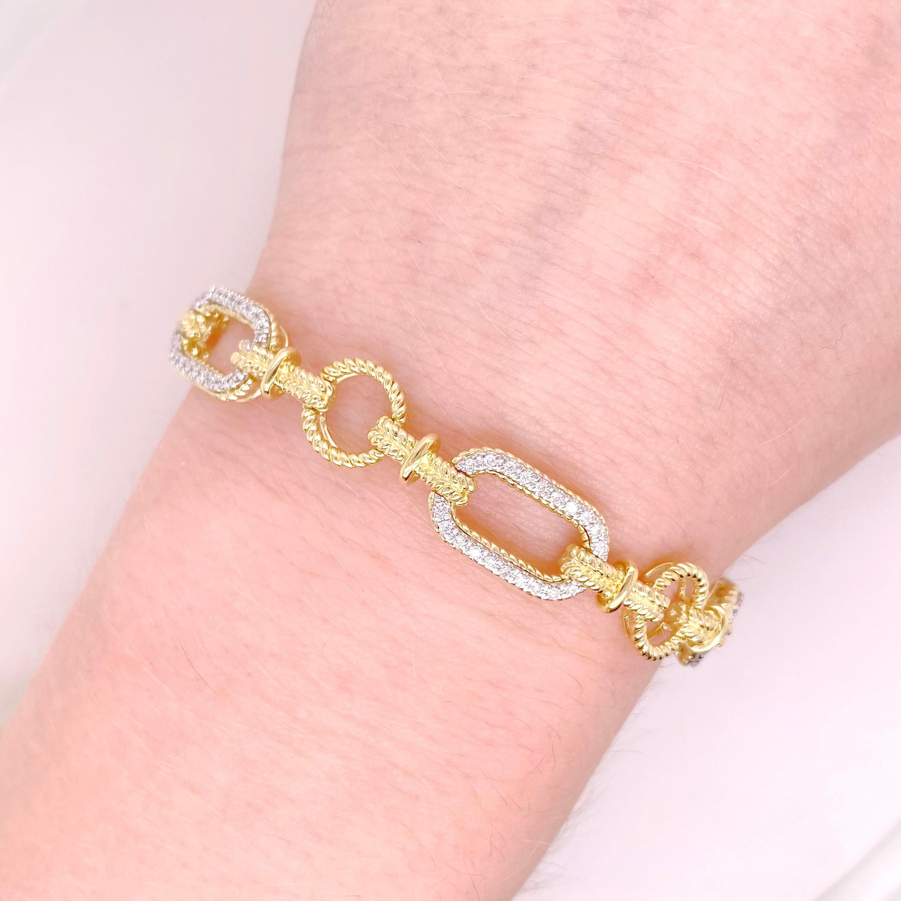 This bracelet is the perfect additional to any fine jewelry collection! The design has pave diamond links alternating with beaded gold links, giving the bracelet a versatile and unique look. The diamonds are bright white, adding contrast next to the