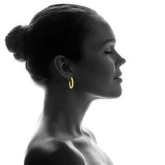 1/2 Carat Diamond Hoop Earrings in 14 Karat Yellow Gold