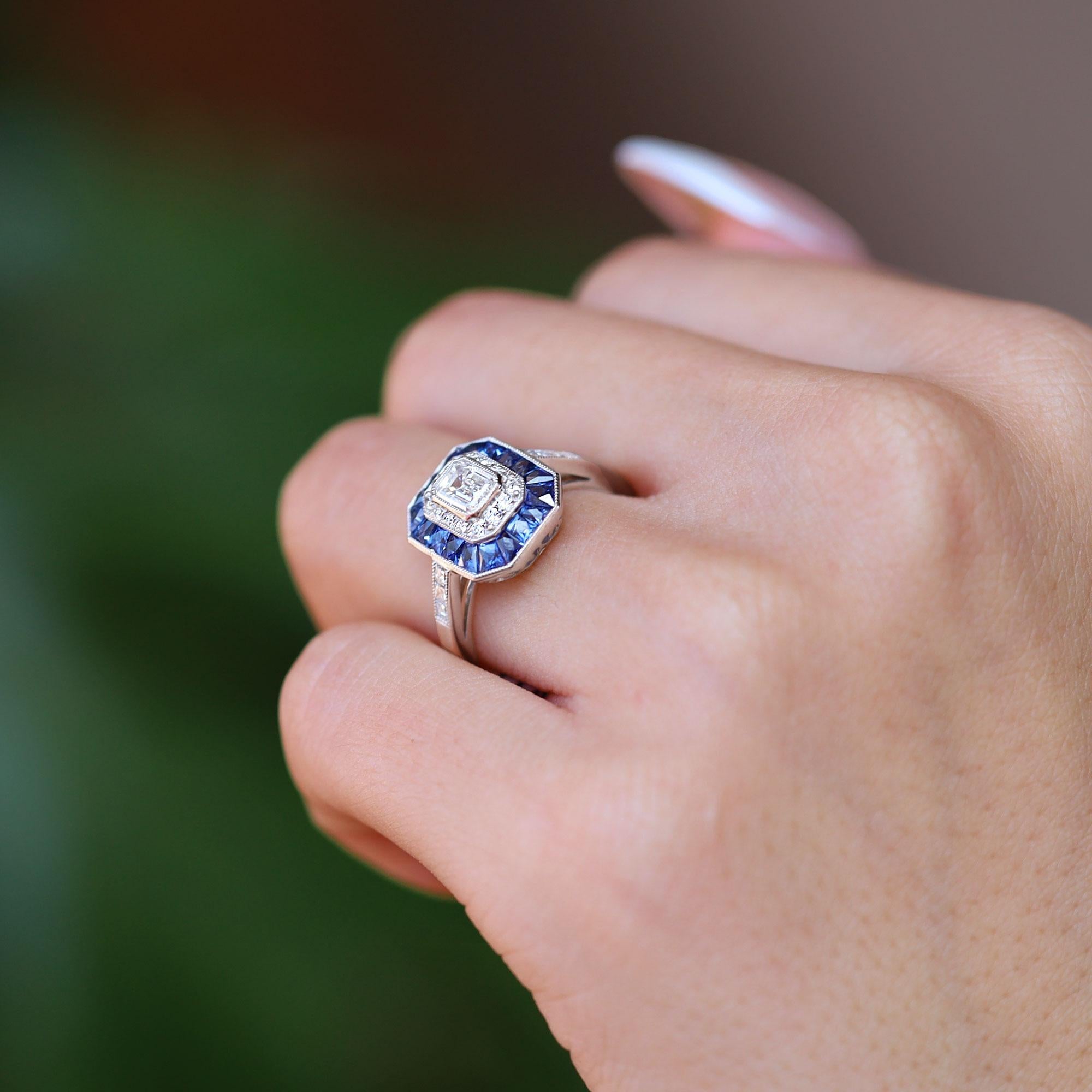 Women's 1/2 Carat Emerald Cut Diamond Art Deco Style Sapphire Halo Engagement Ring For Sale