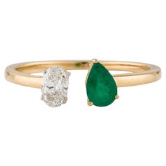 1/2 Carat Pear Emerald & Oval Diamond Twin Ring in Gold