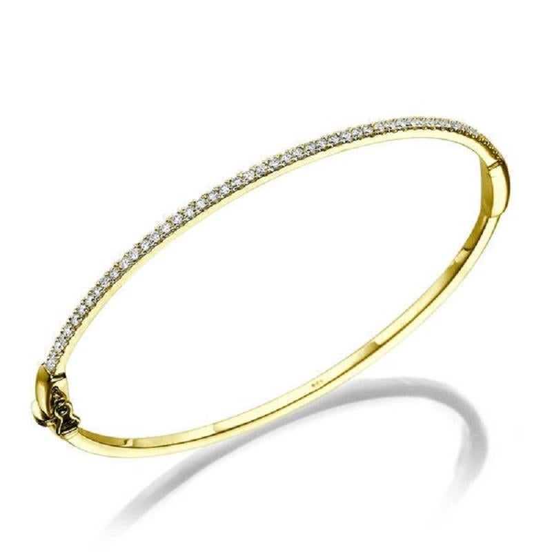 A classic Diamond bangle made of 14K Yellow Gold set with 50 Diamonds. The total carat weight of this beautiful Diamond bangle is 0.50 carat, D-F color and VS clarity.
Can be made in 6.7 or 8 inch. 
 
 Metal Type: 
 This bracelet can be made in
